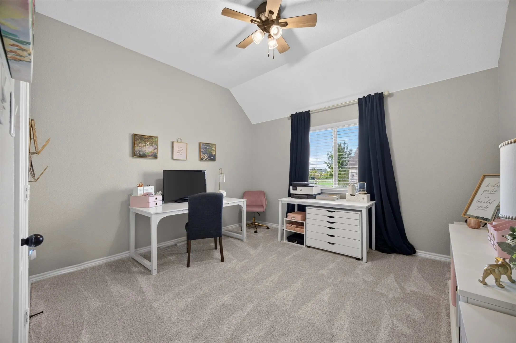 Fourth bedroom with walk-in closet, currently set up as a craft room