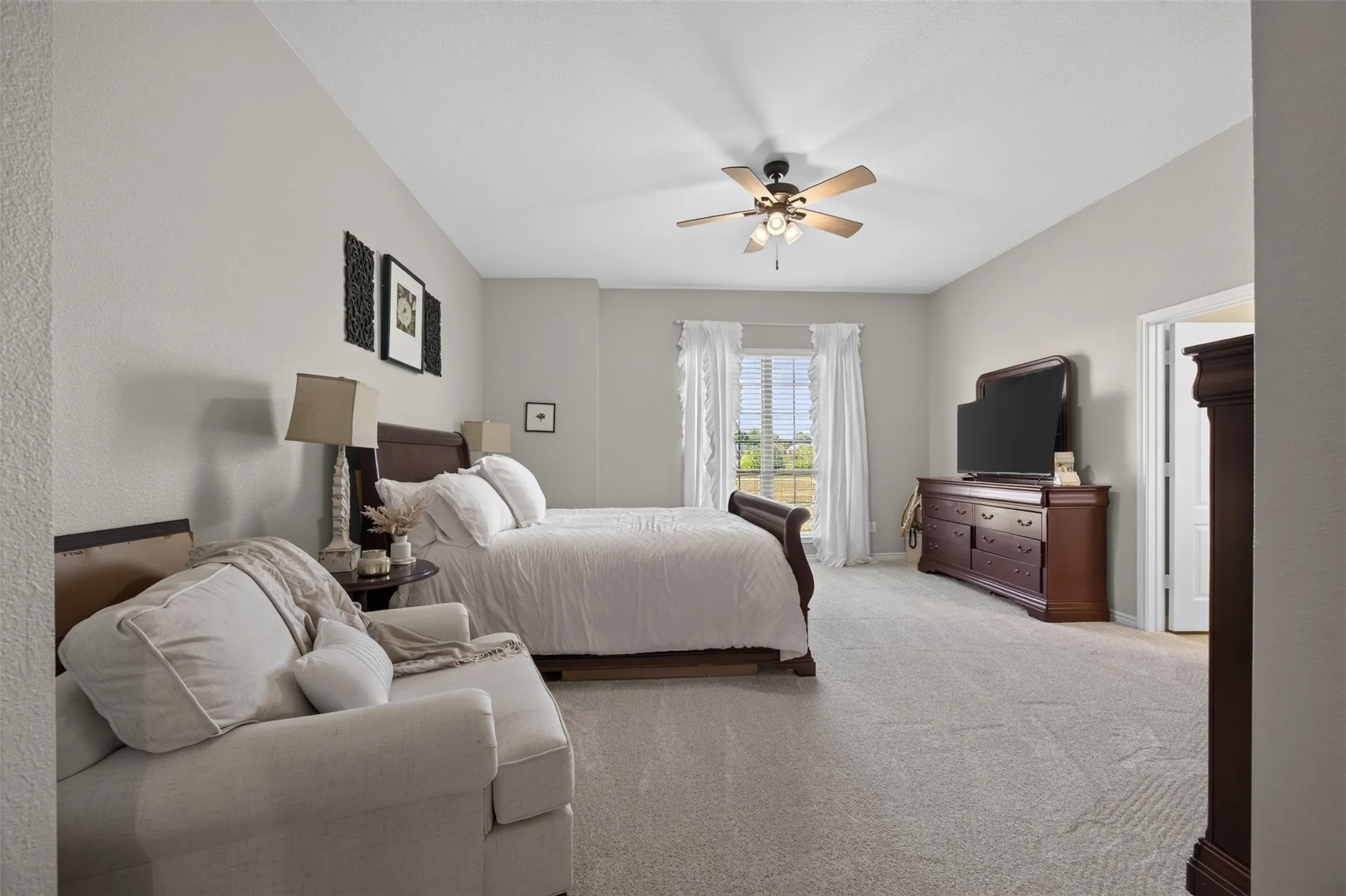 Second primary suite at the front of the home, away from the main suite