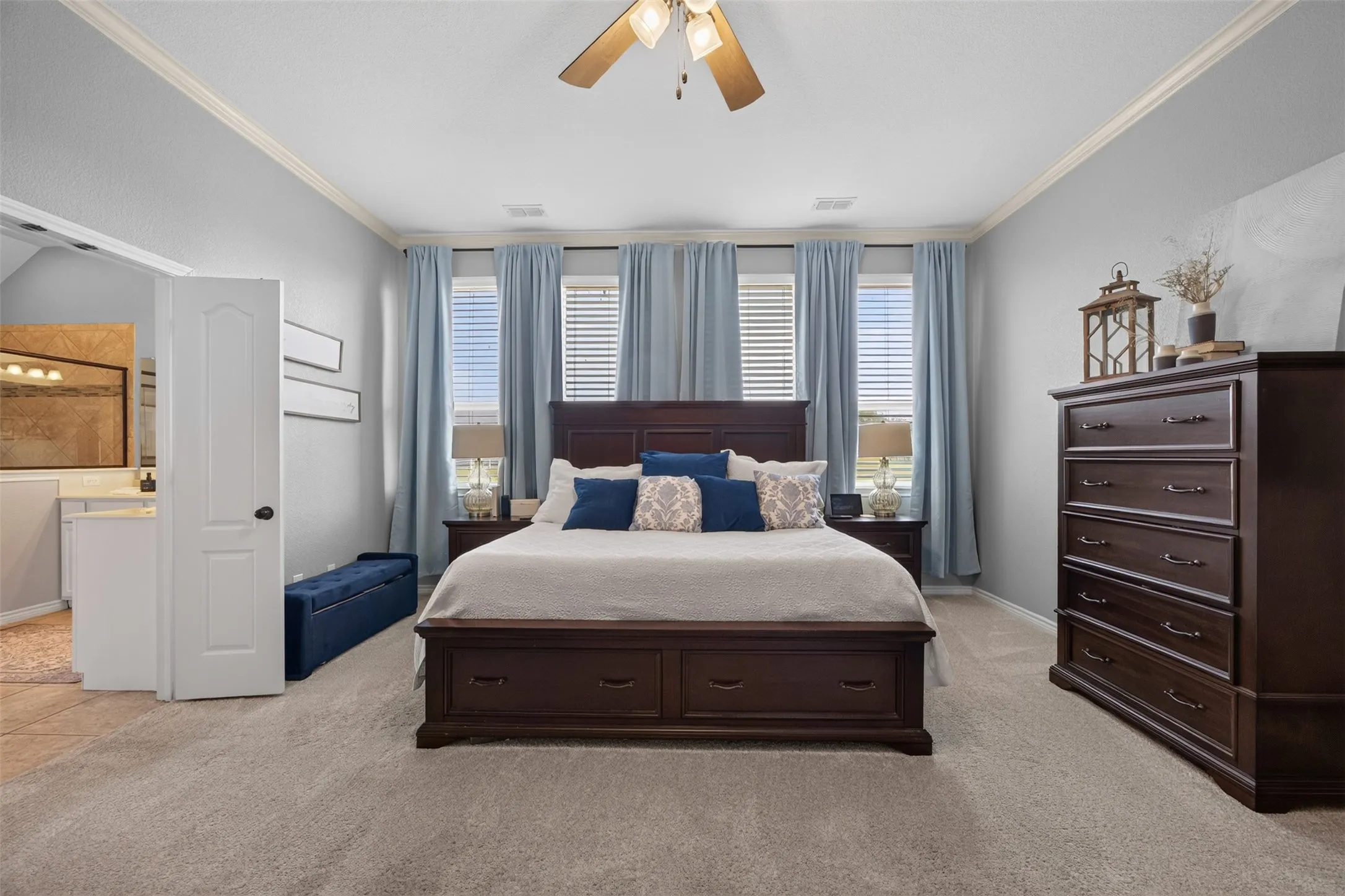 Main primary suite at the back of the home with sitting area