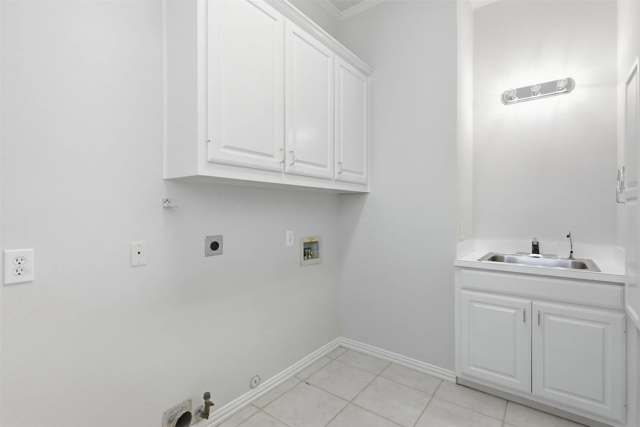 Separate laundry with sink