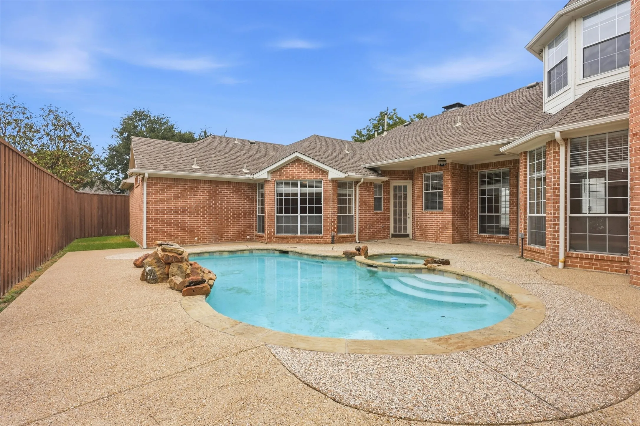 Pool & spa with some yard