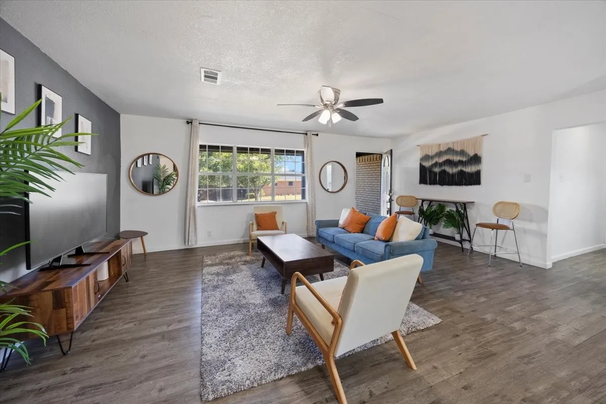Step into a spacious, bright living room.