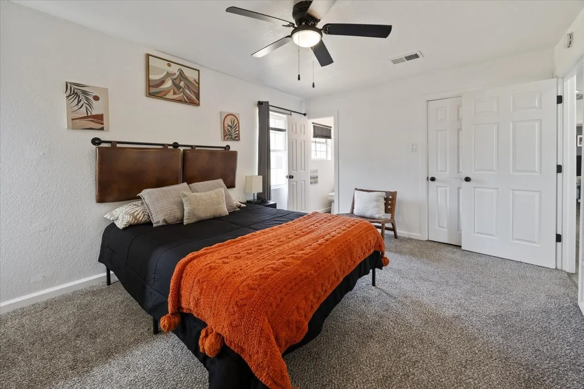 Primary bedroom with half bath.