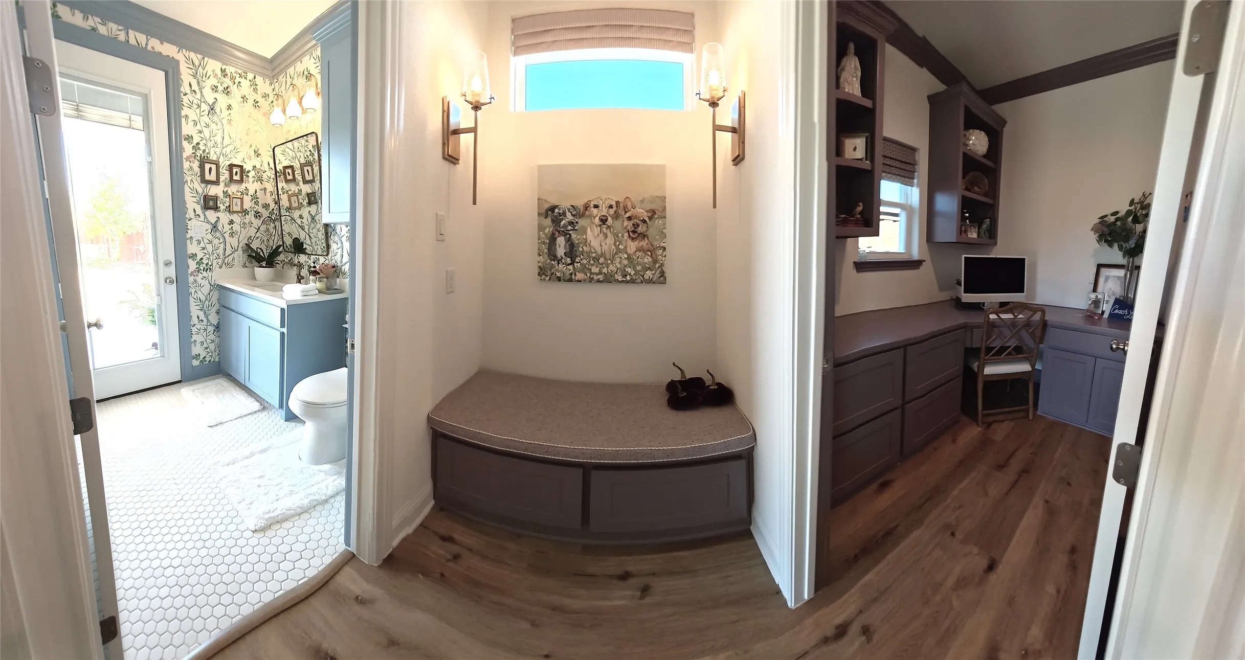 Built-in bench with storage, overhead transom window, and dual wall sconces