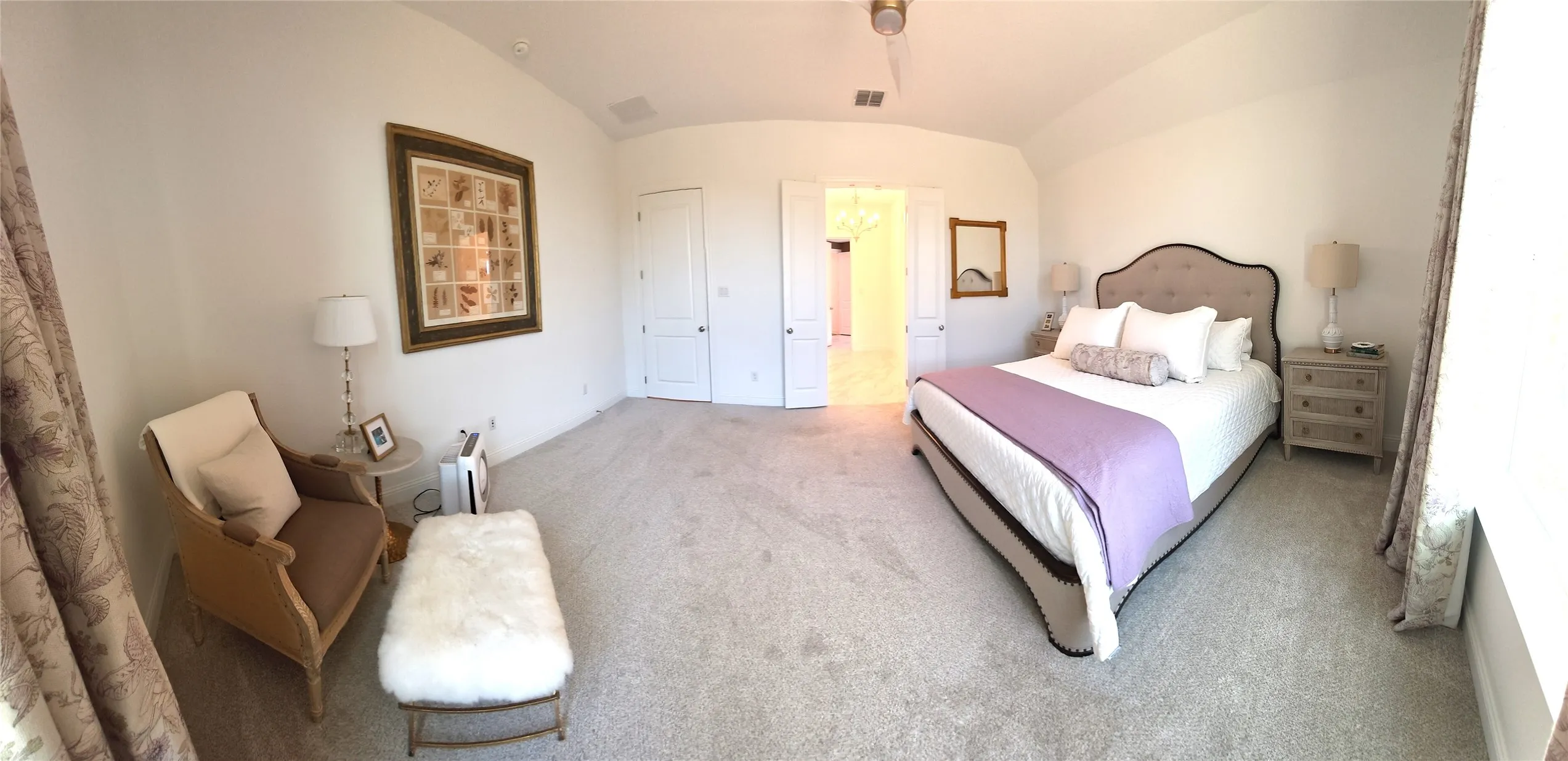 Carpeted room with a vaulted ceiling, recessed lighting, and a ceiling fan