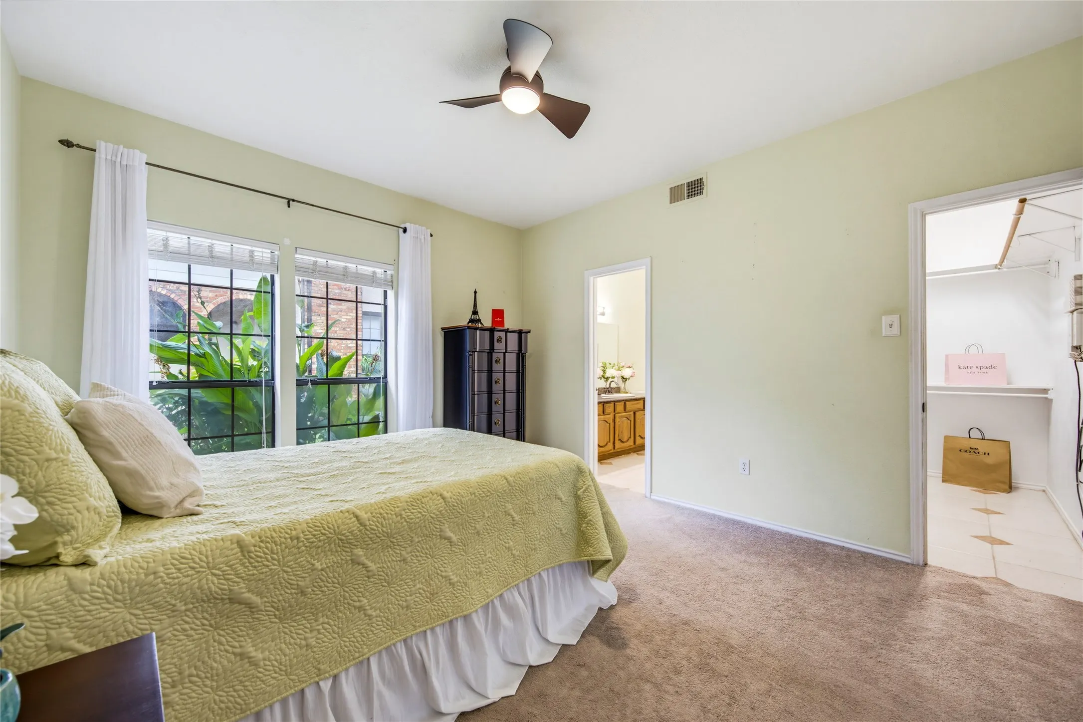 Looking into the attached bath and walk in closet....