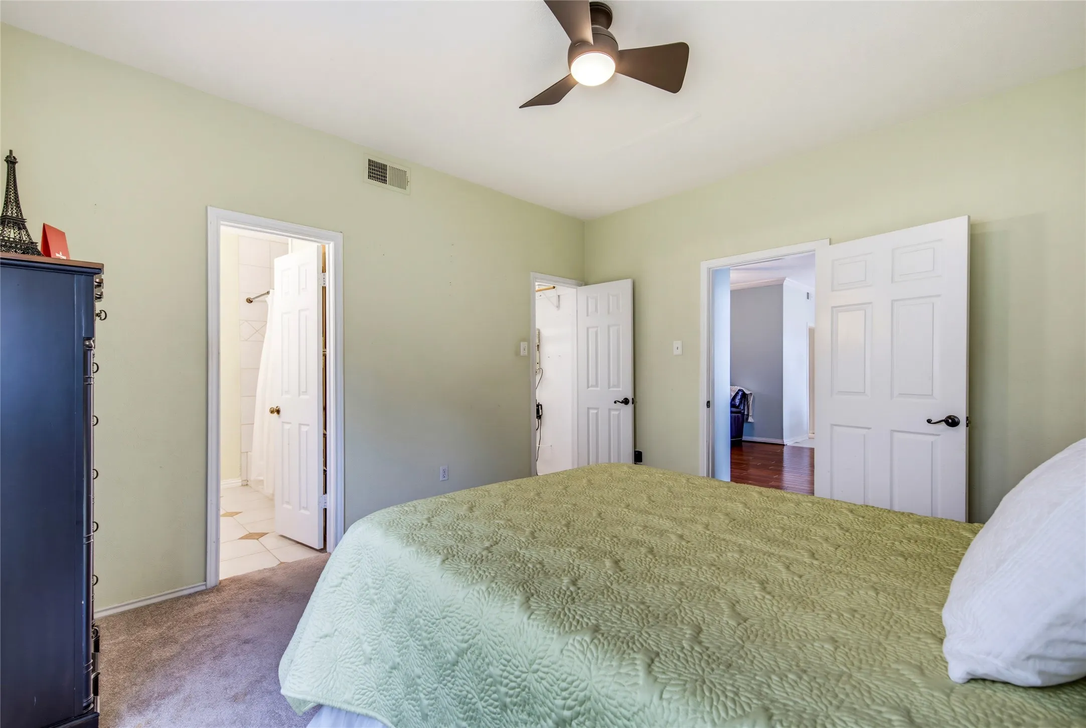 Separate from the rest of the living space....the primary is tucked away off the living room....away from the 2nd bedroom on the other side of the unit....