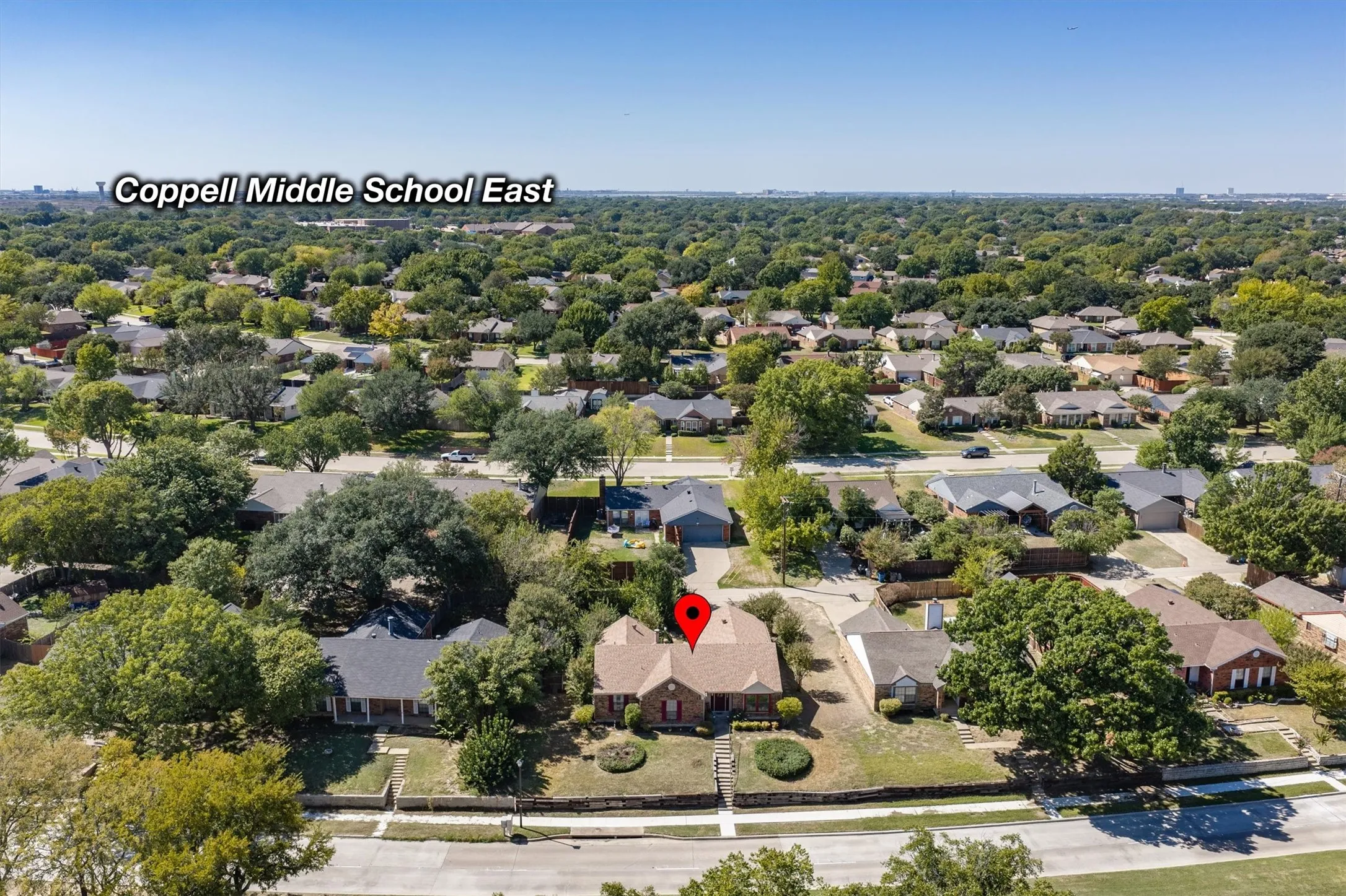 Neighborhood overview with a prominent school in the vicinity