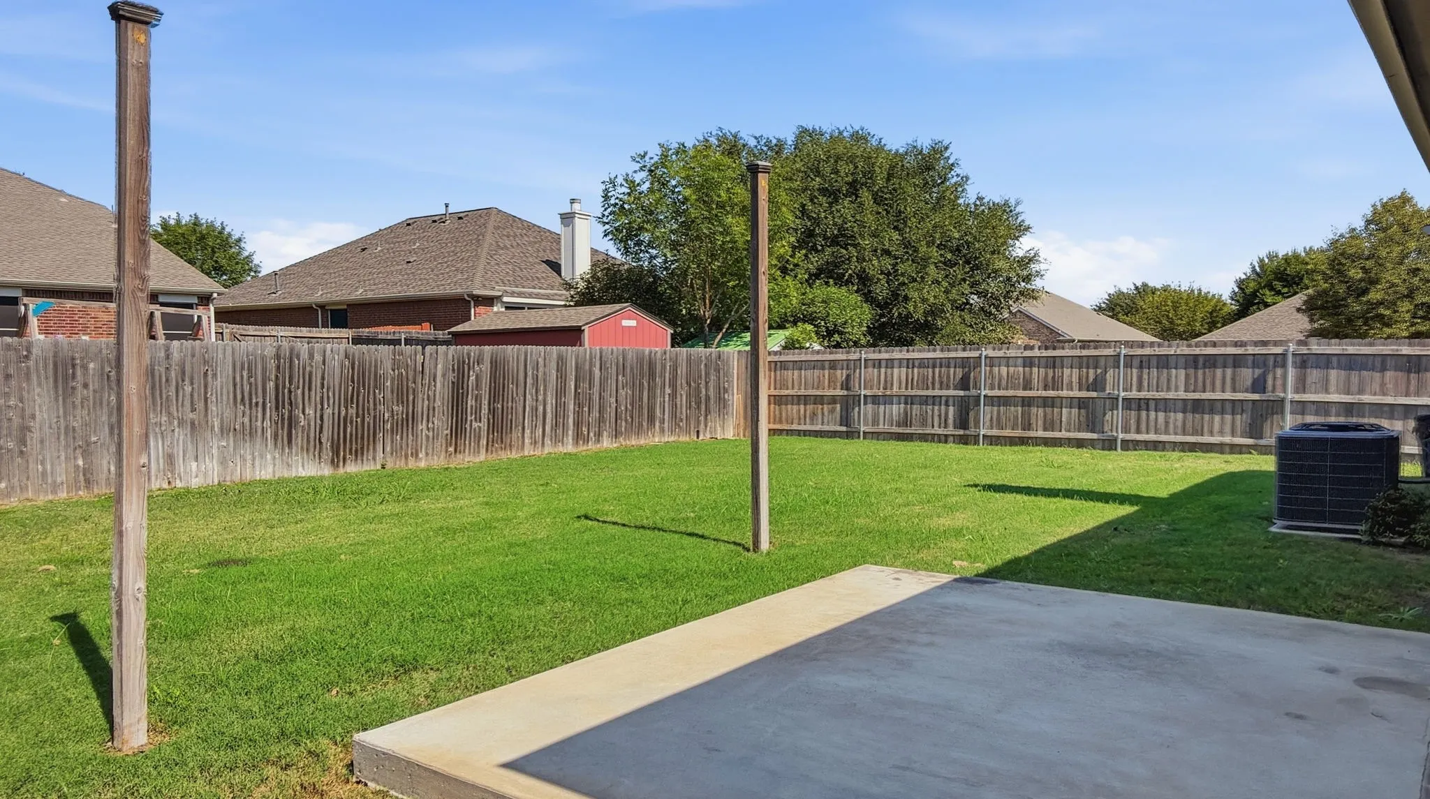 Back yard extended concrete patio