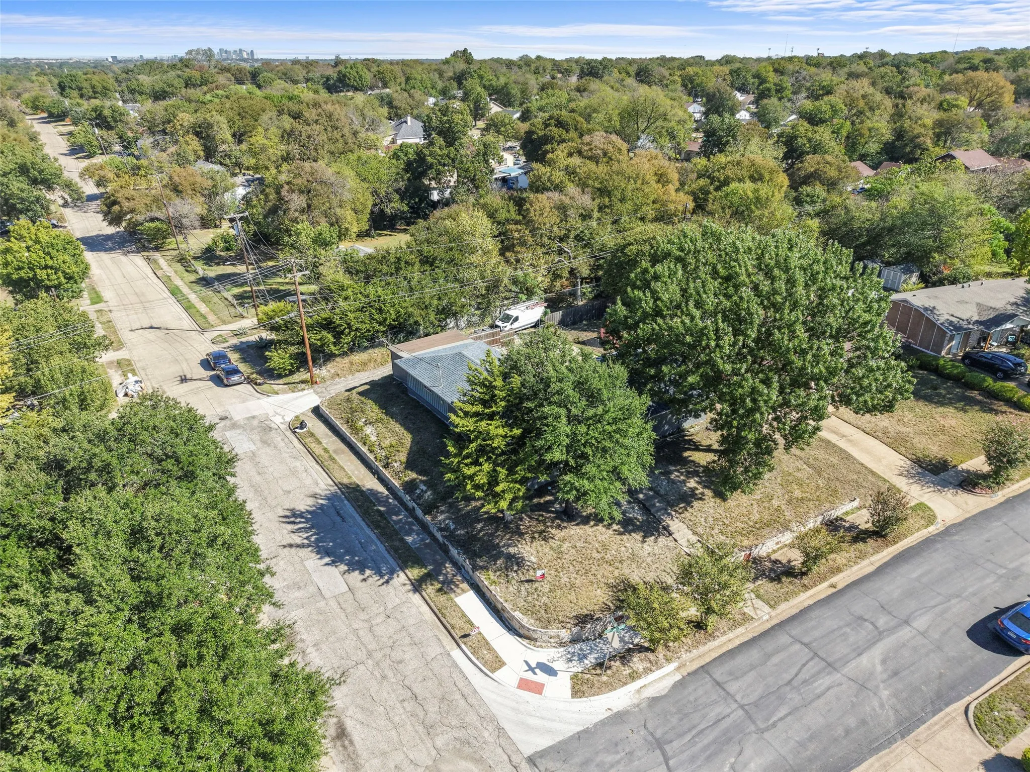 Corner lot with mature trees and established landscaping