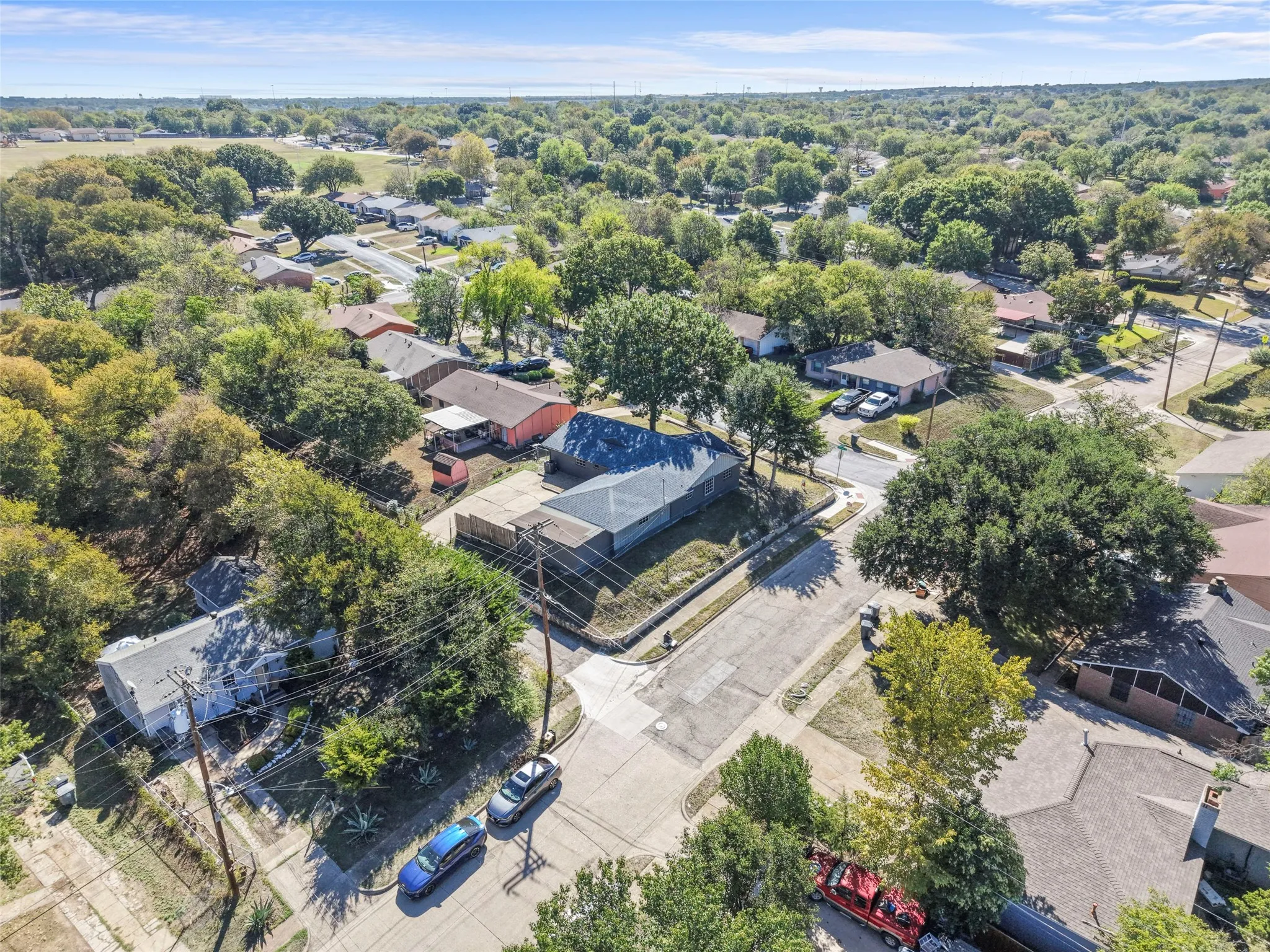 Residential neighborhood with mature​​‌​​​​‌​​‌‌​‌‌​​​‌‌​‌​‌​‌​​​‌​​ trees