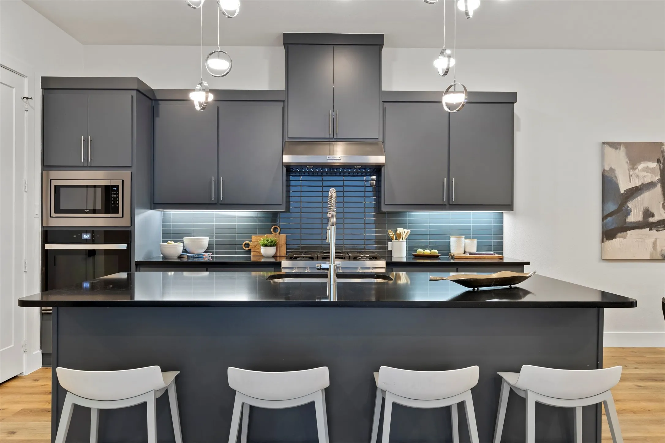Ample seating is available at this breakfast bar, creating an inviting and functional space that is perfect for casual morning meals or social gatherings.