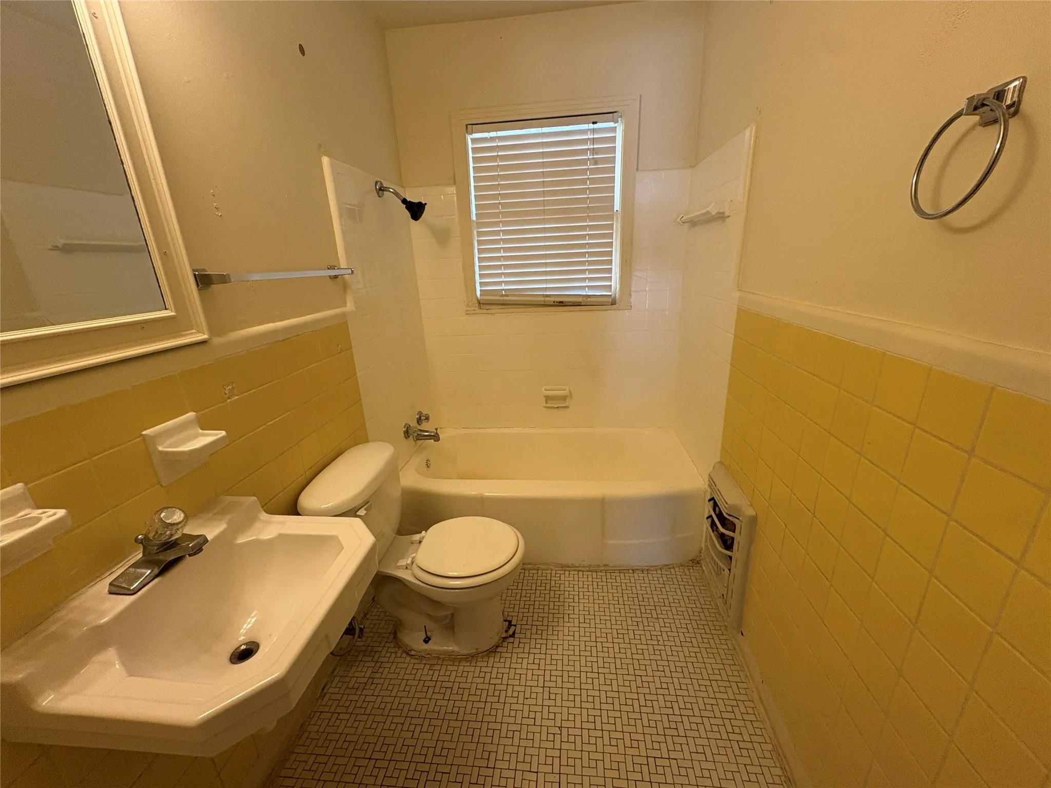 White ceramic bathtub and toilet