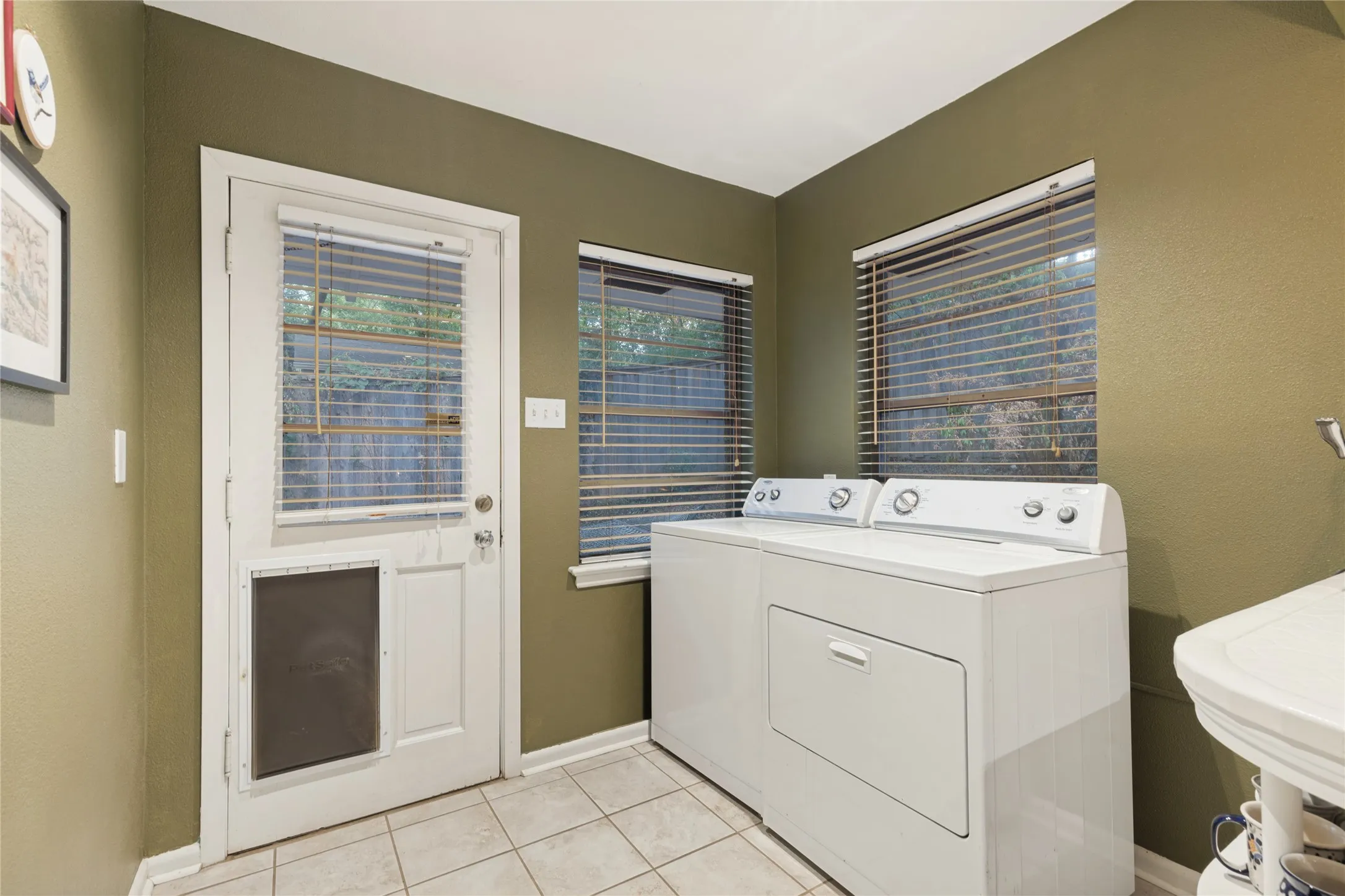 The Utility Room provides additional storage and convenient access to the outdoors.