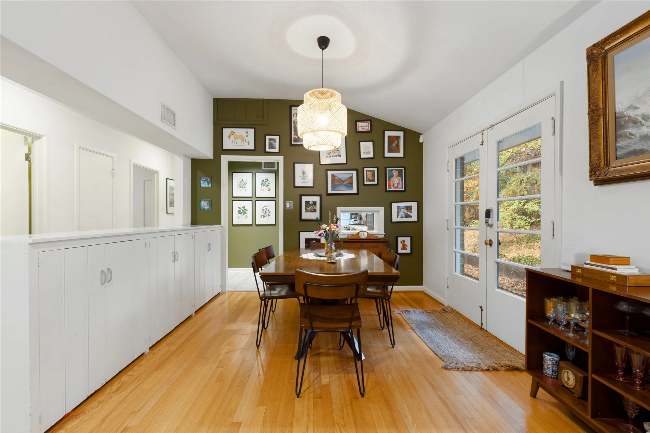 An original built-in serving buffet brings craftsmanship, storage and architectural character to the Dining Room.
