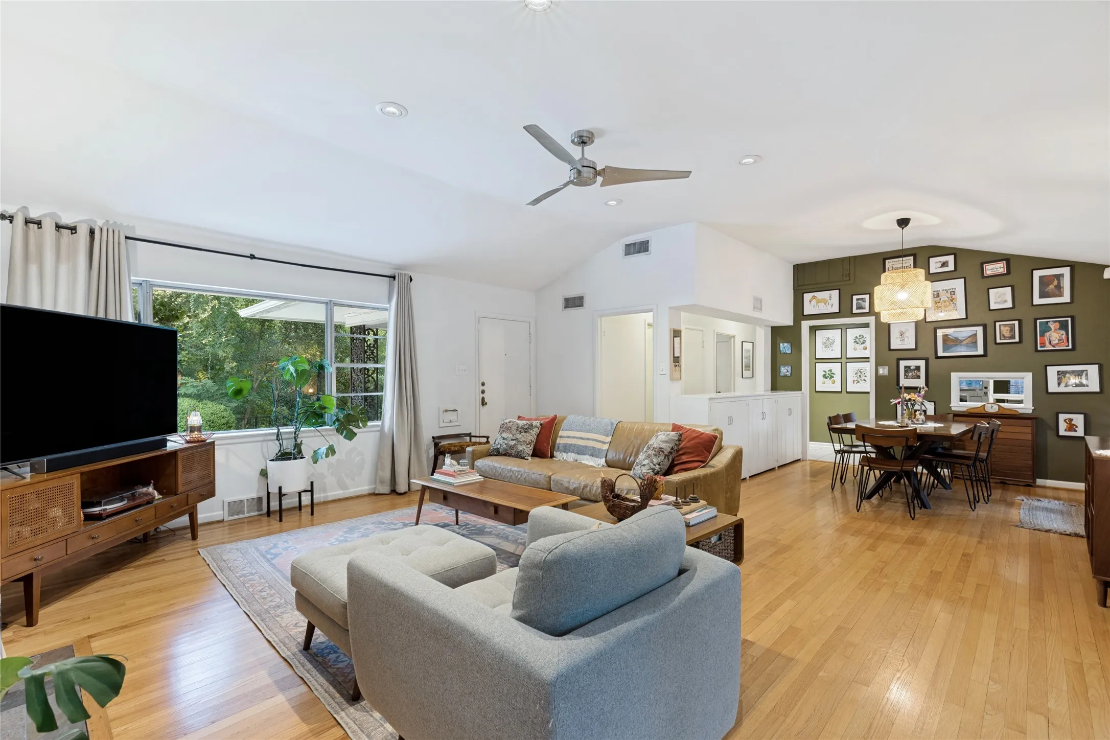 The open relationship between Living and Dining spaces gives the home an easy, informal flow.