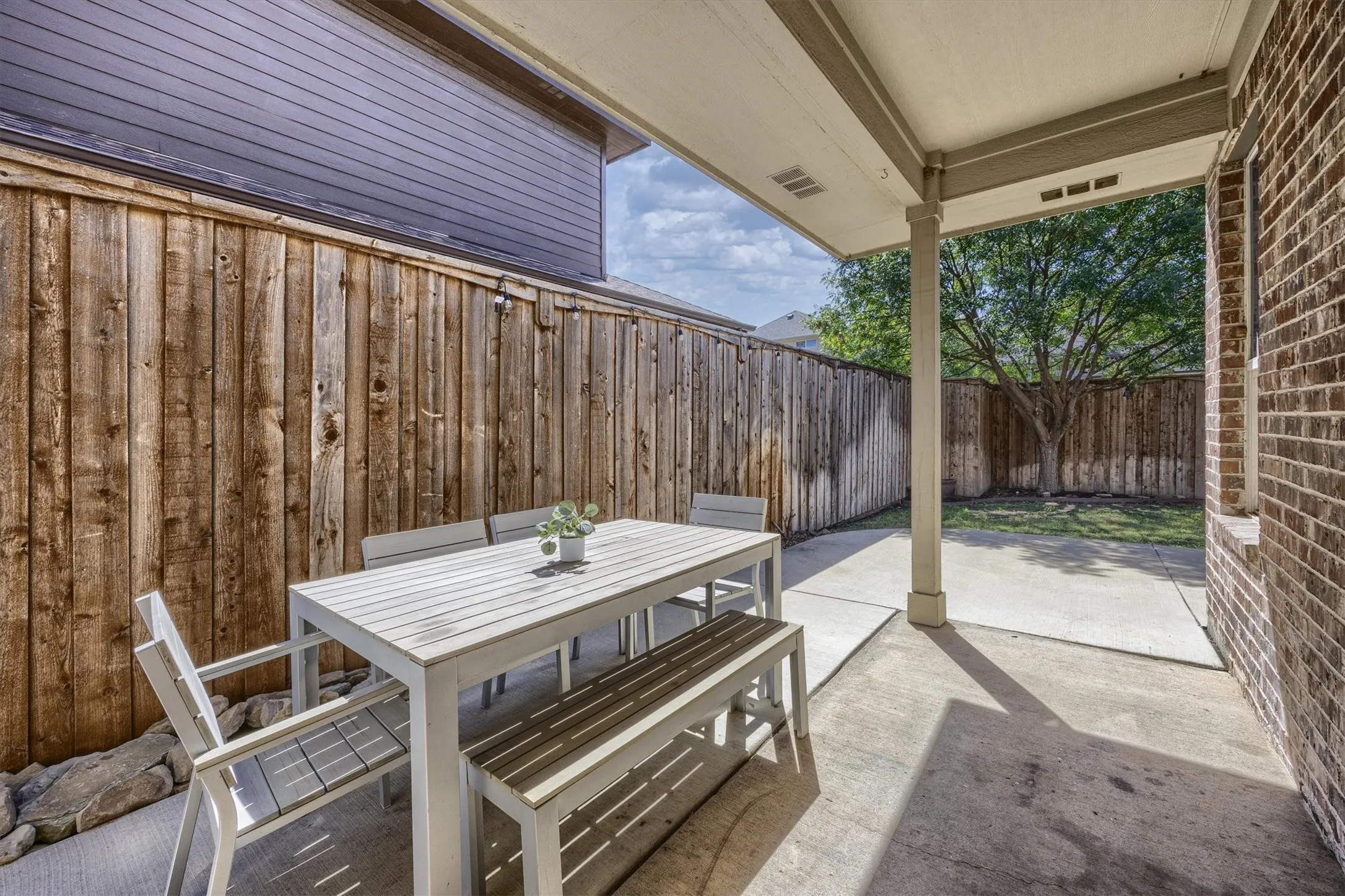Enjoy morning coffee or a casual meal on the covered back patio!