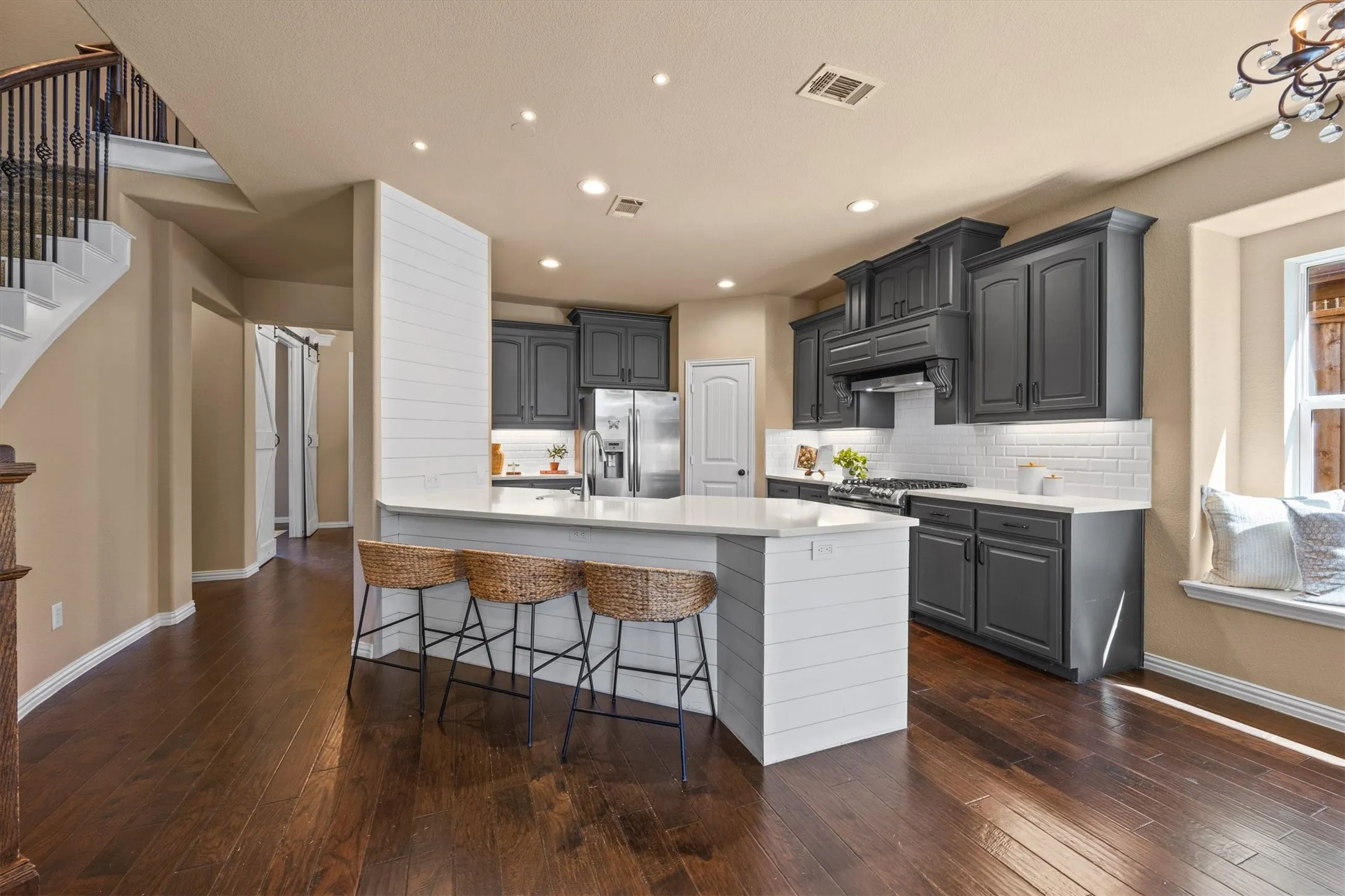 Pull up a seat at the kitchen island for a quick breakfast or conversation while dinner cooks!