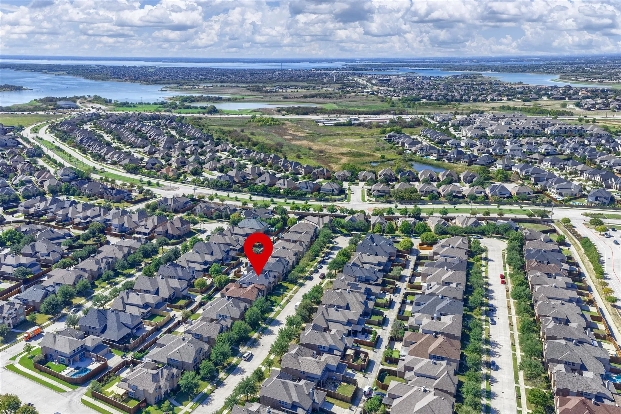 This aerial perspective gives you a closer look at the surrounding streets and neighborhood layout.
