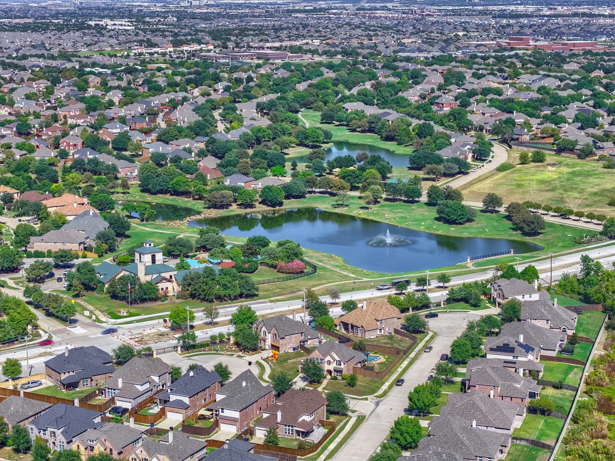 Nearby ponds, fountains, and green spaces add to the beauty of the surrounding area.