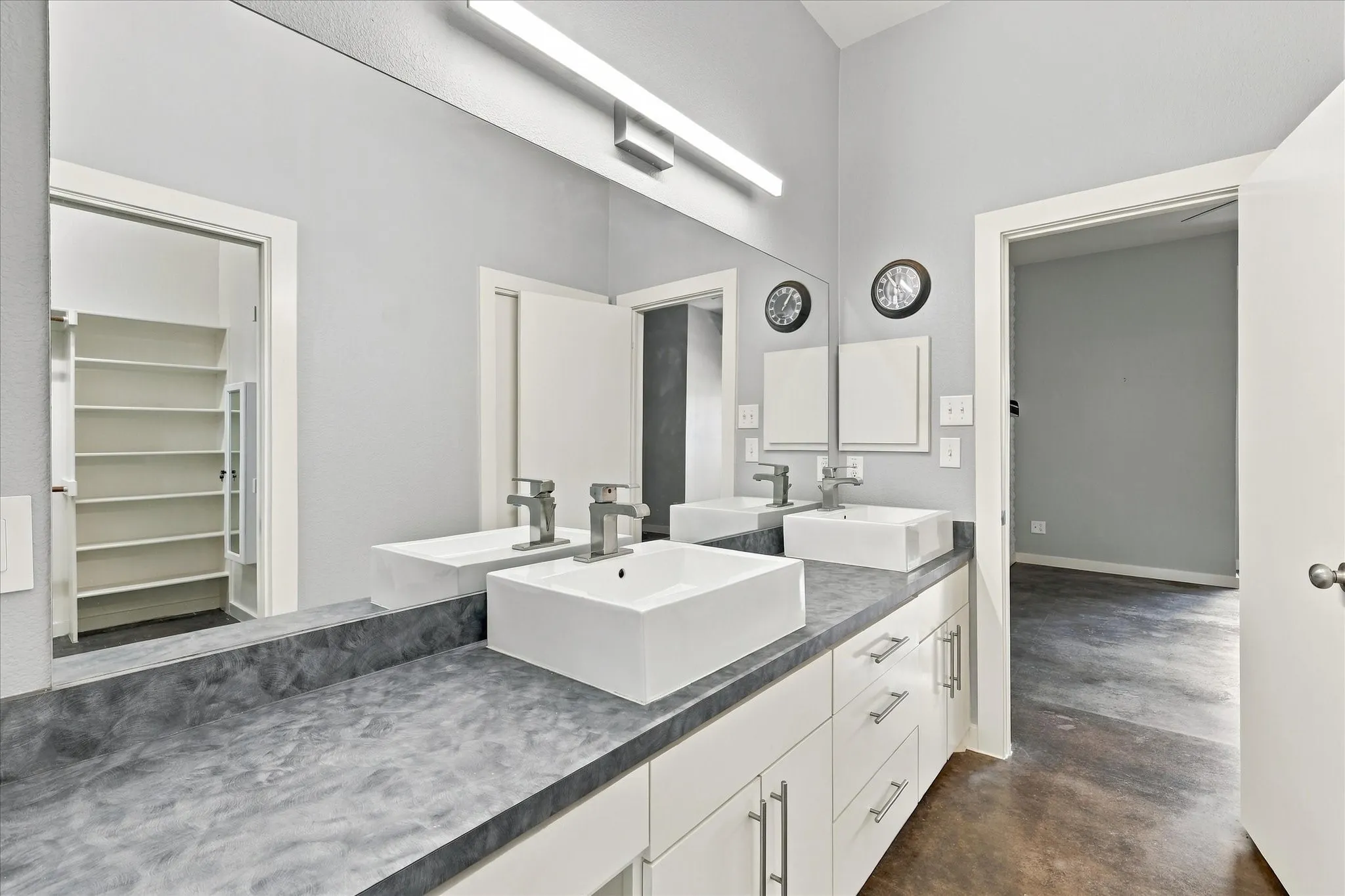 Dual sinks & large walk-in shower in the ensuite bath.
