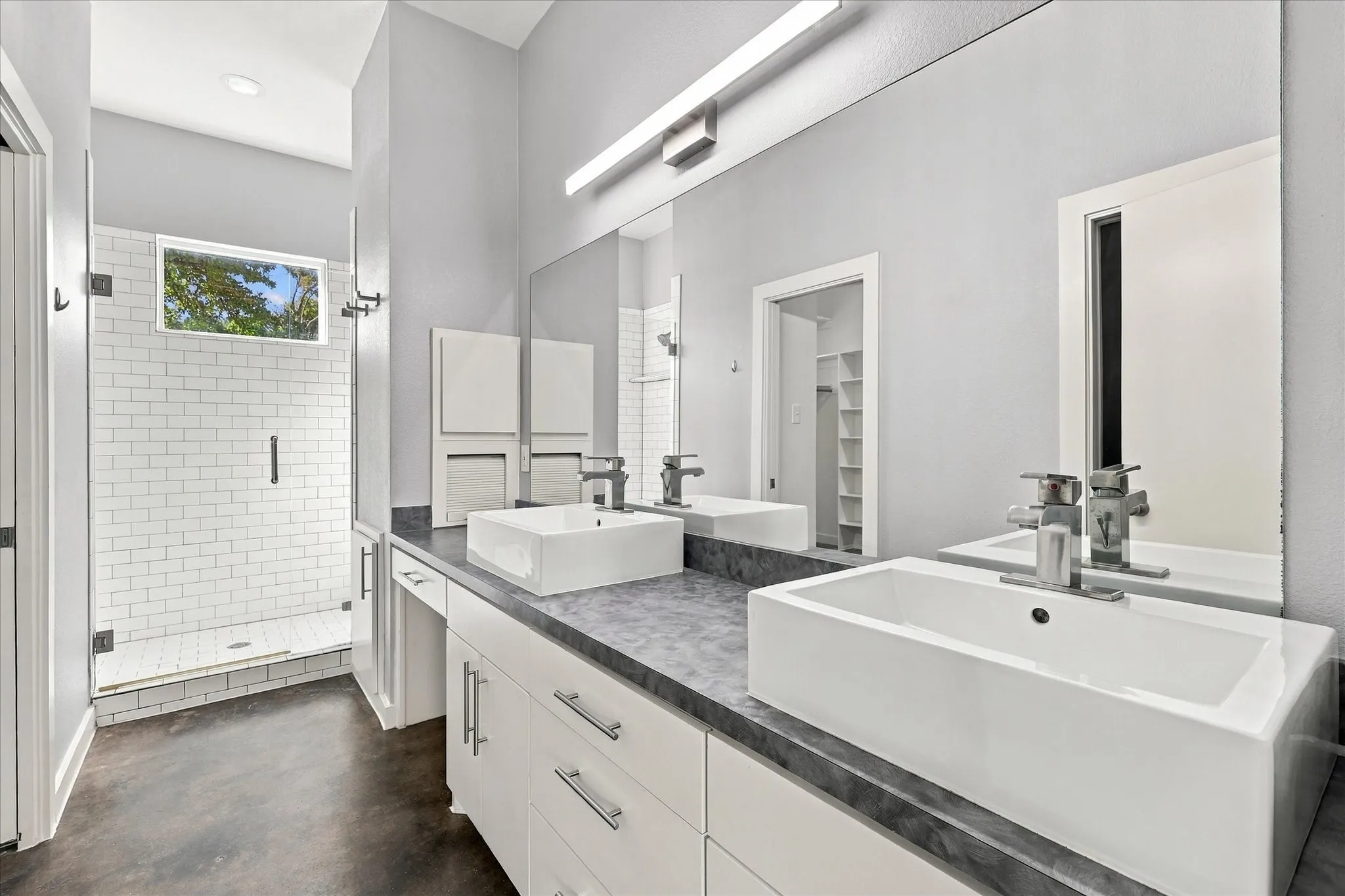 Dual sinks & large walk-in shower in the ensuite bath.