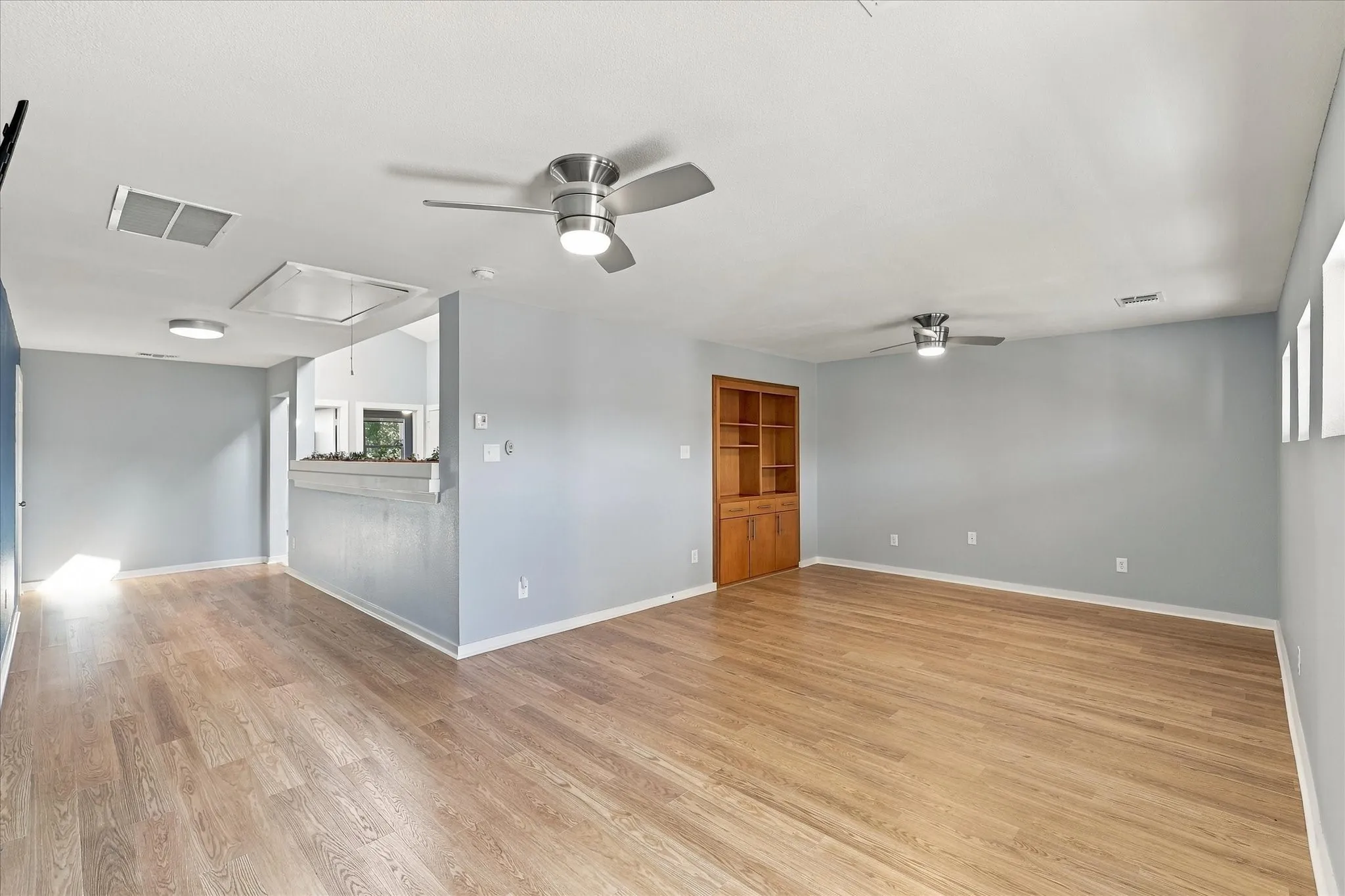 Upstairs is a large loft area leading to a game room with balcony.