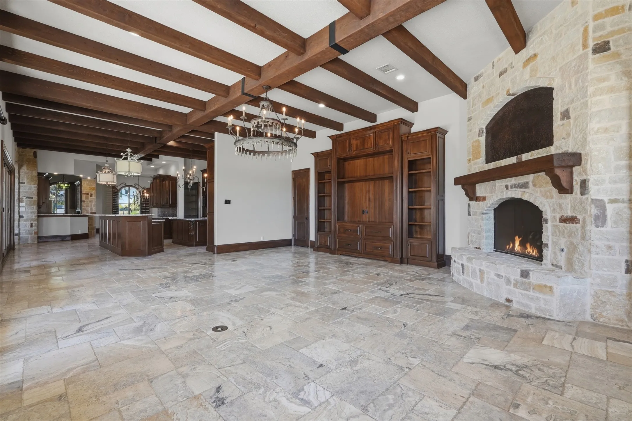The family room is finished with the same attention to detail found throughout the home. Remote-controlled window shades and wood-encased windows frame beautiful views of the outdoors while allowing natural light to pour in year-round.