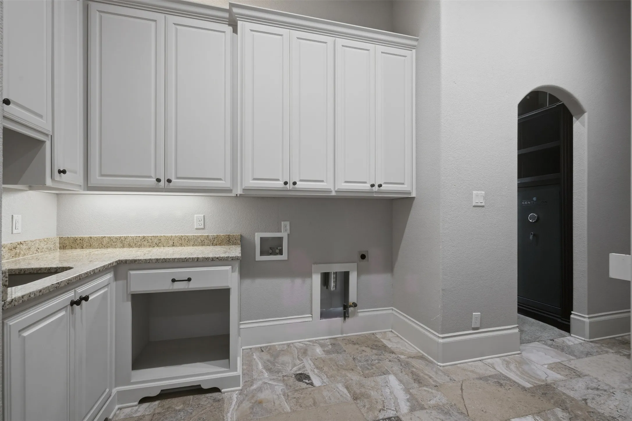 Full-size laundry with fantastic storage connects to the primary closet - making laundry time as convenient as can be!