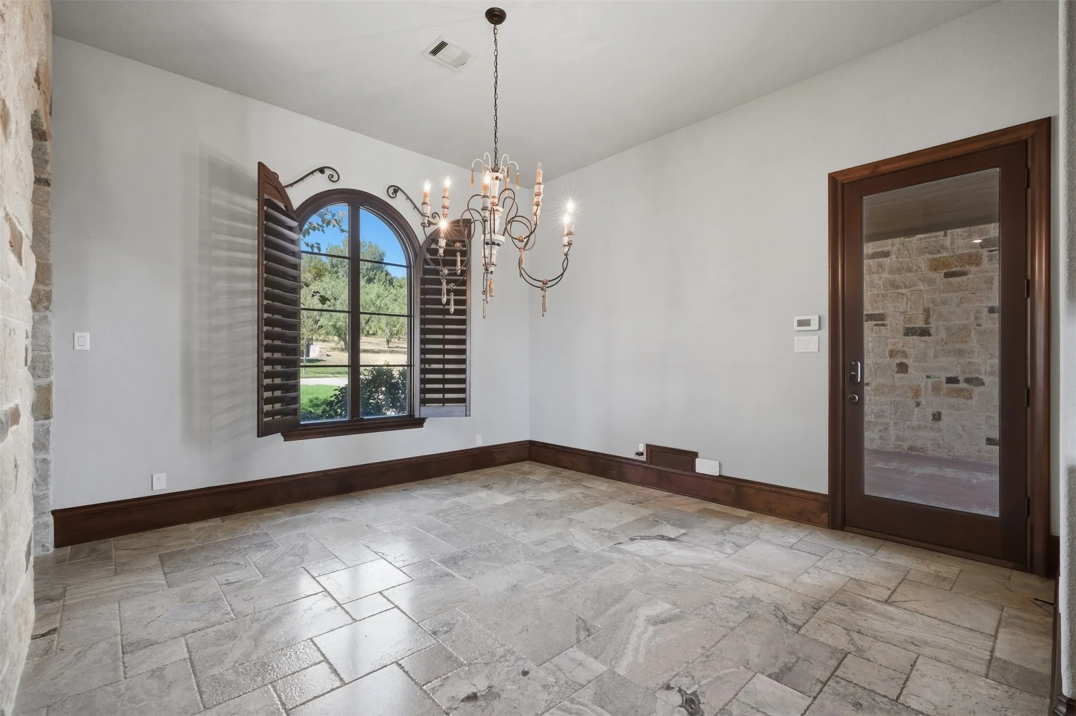 The eat-in kitchen area is a warm and inviting space, perfectly suited for casual morning meals and everyday dining.