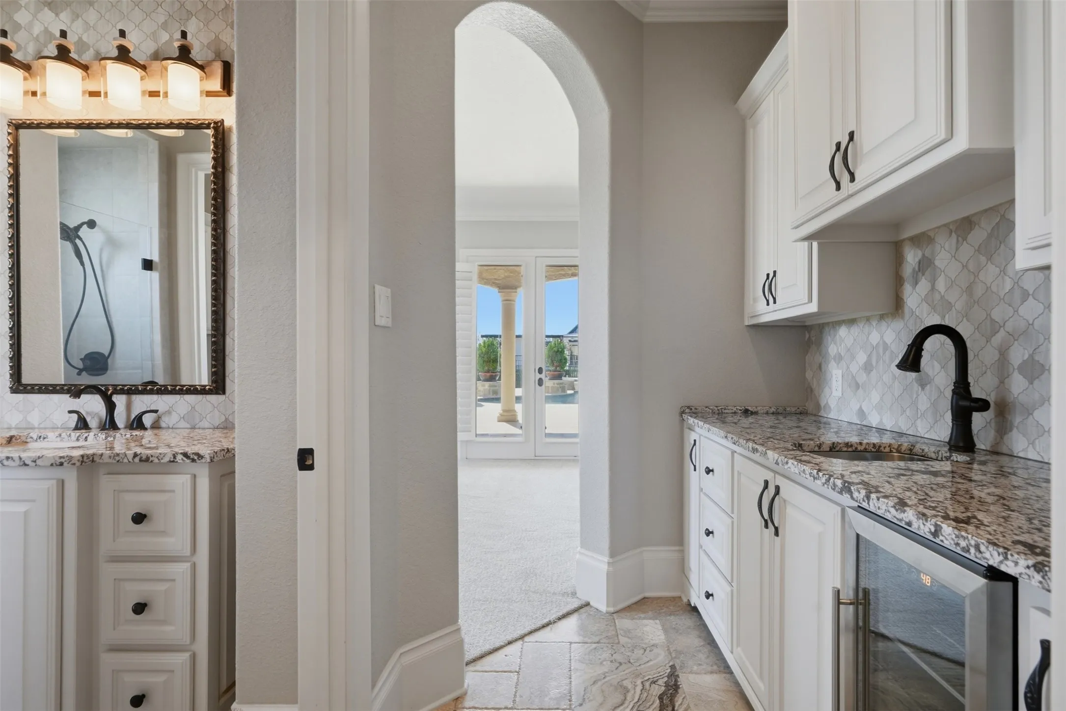 Private coffee bar with mini fridge and sink may have your guests never wanting to leave!