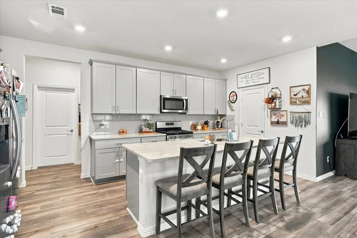 Kitchen view w breakfast bar