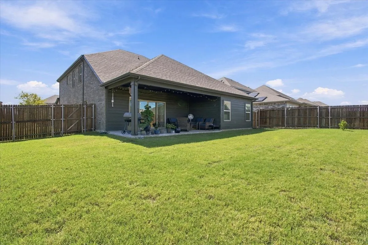 Back yard and back patio view