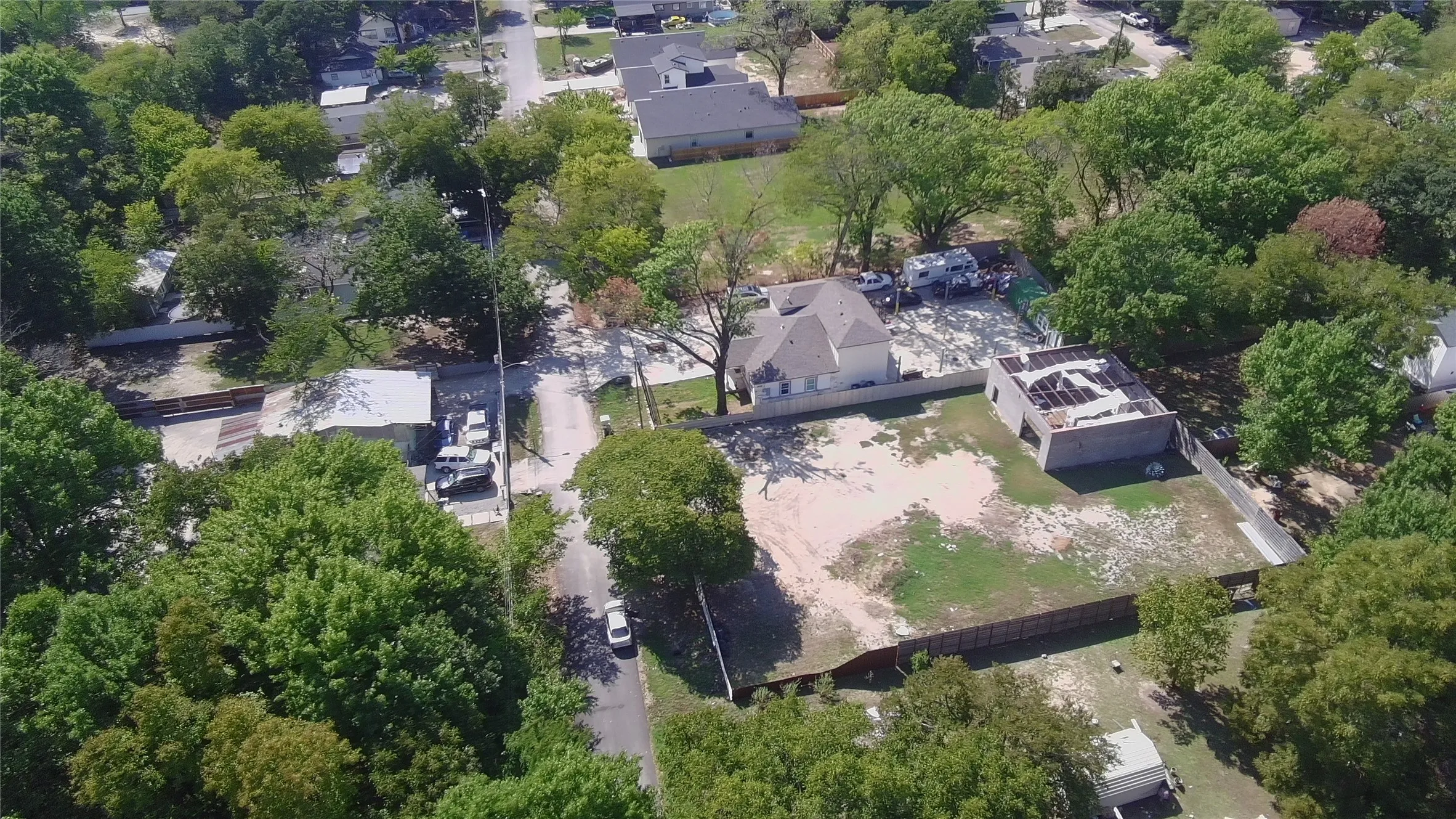 Aerial view of adjacent lots; boundaries not depicted.