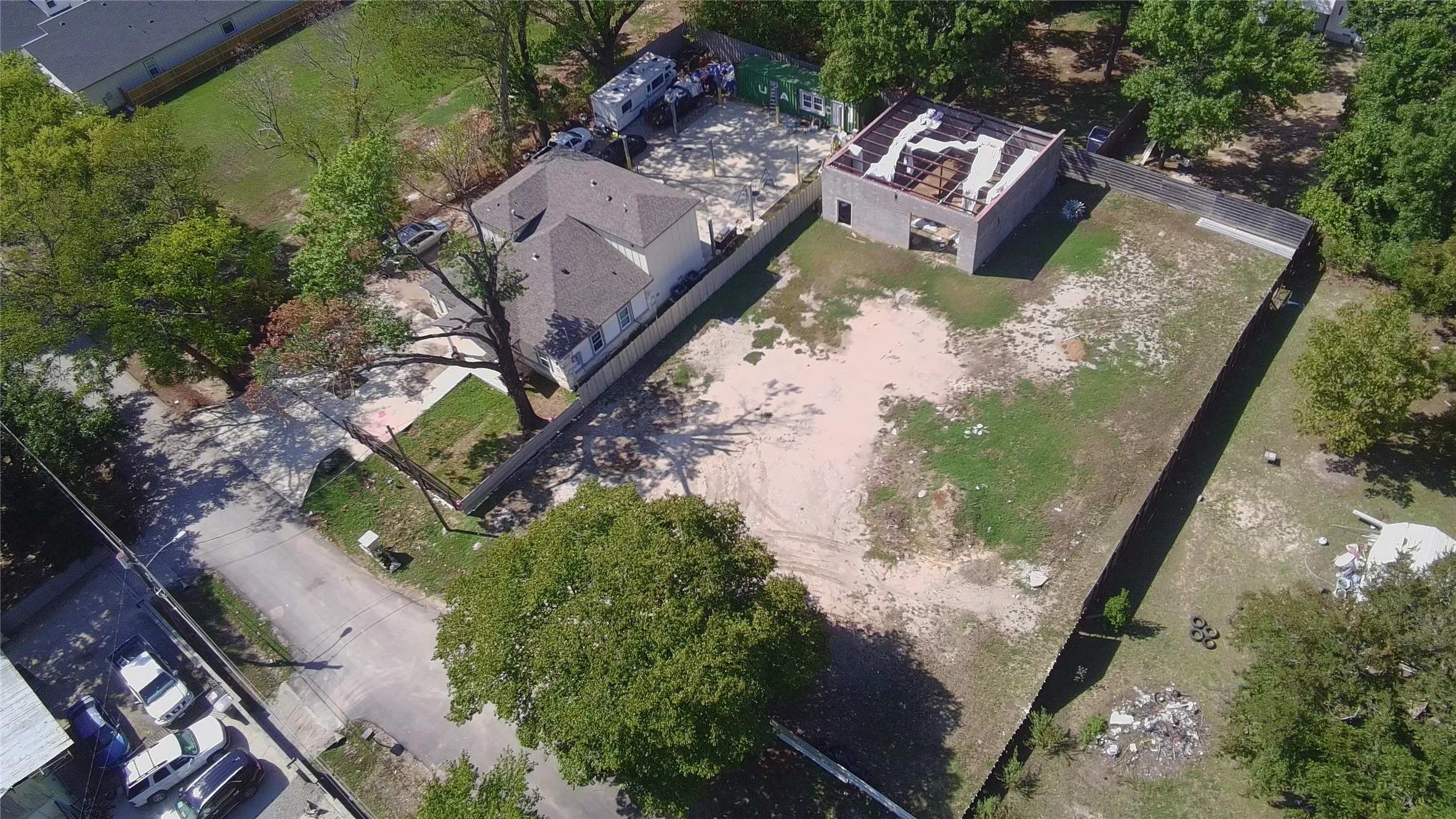 Aerial view of adjacent lots; boundaries not depicted.
