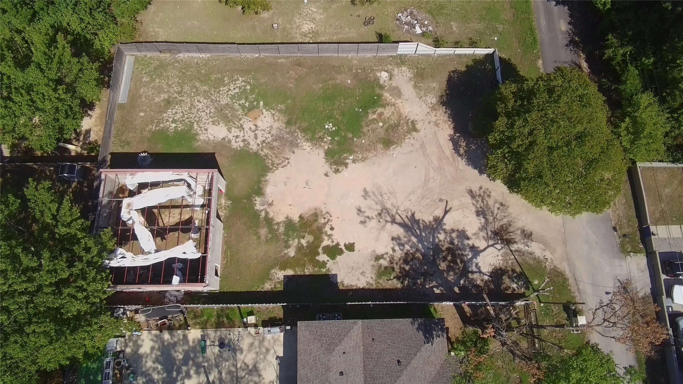 Aerial view of adjacent lots; boundaries not depicted.