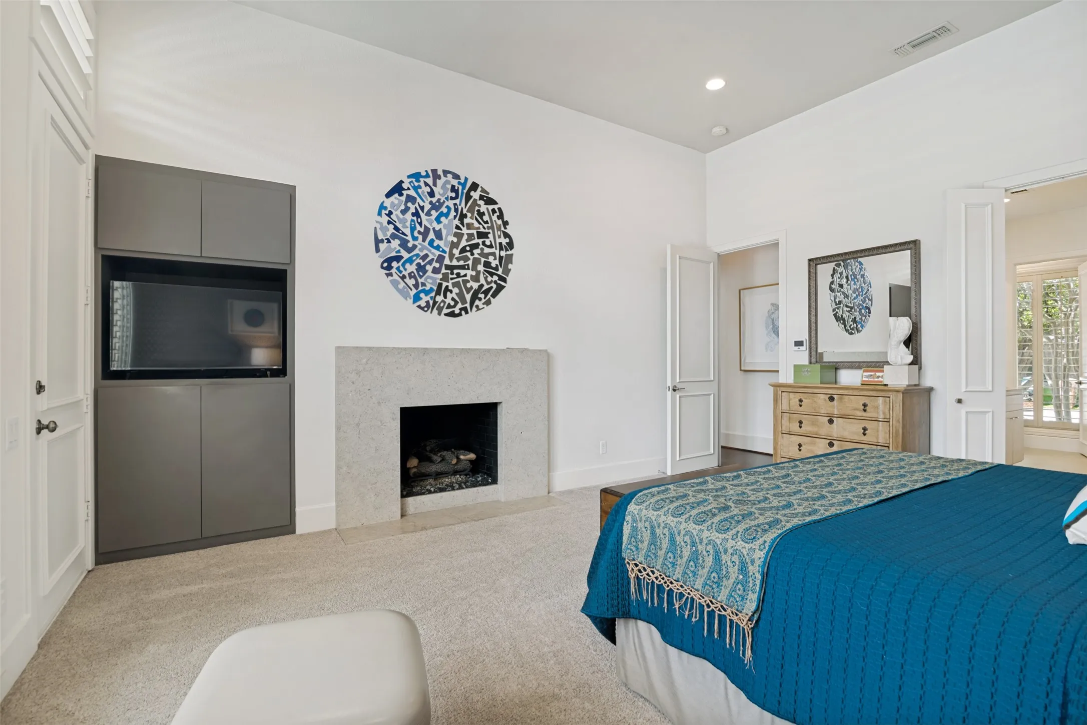 Fireplace adds a cozy feel to this suite.