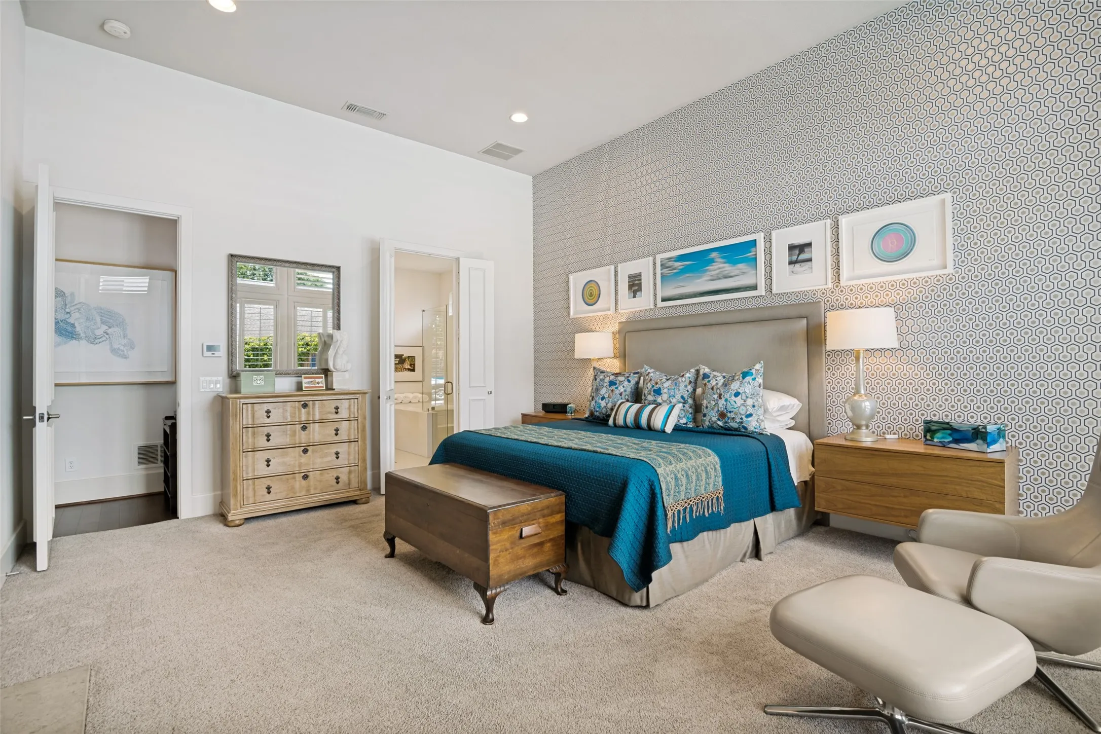 The primary suite...private with a warm ambiance.