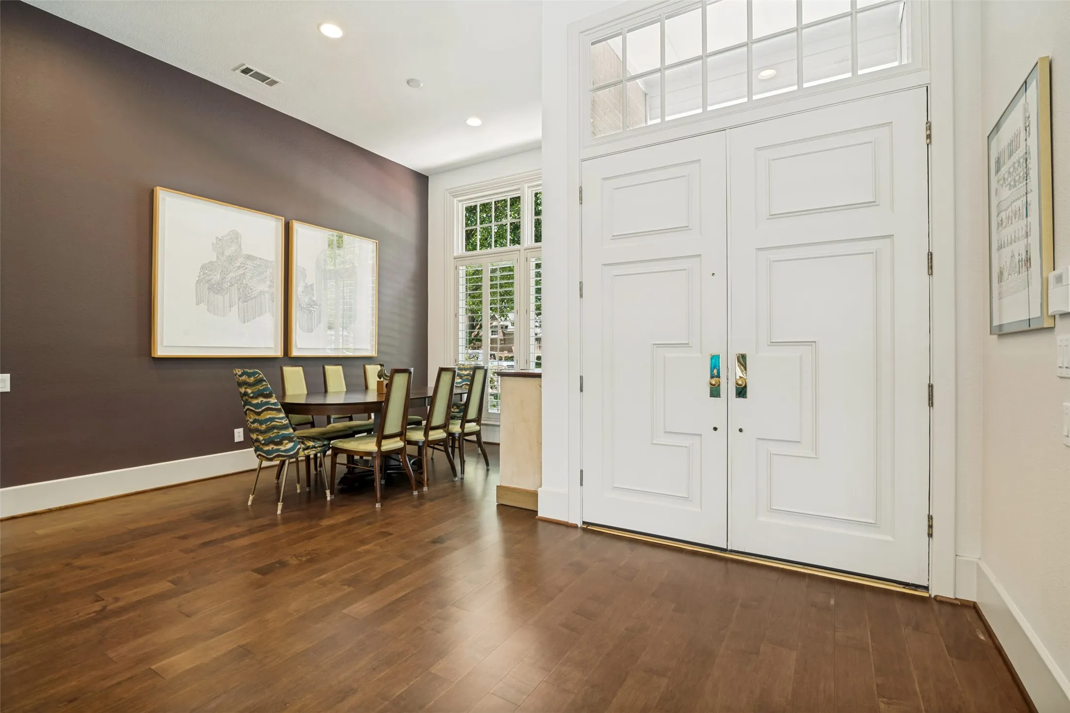 Bright, open entry. Formal dining on the right.