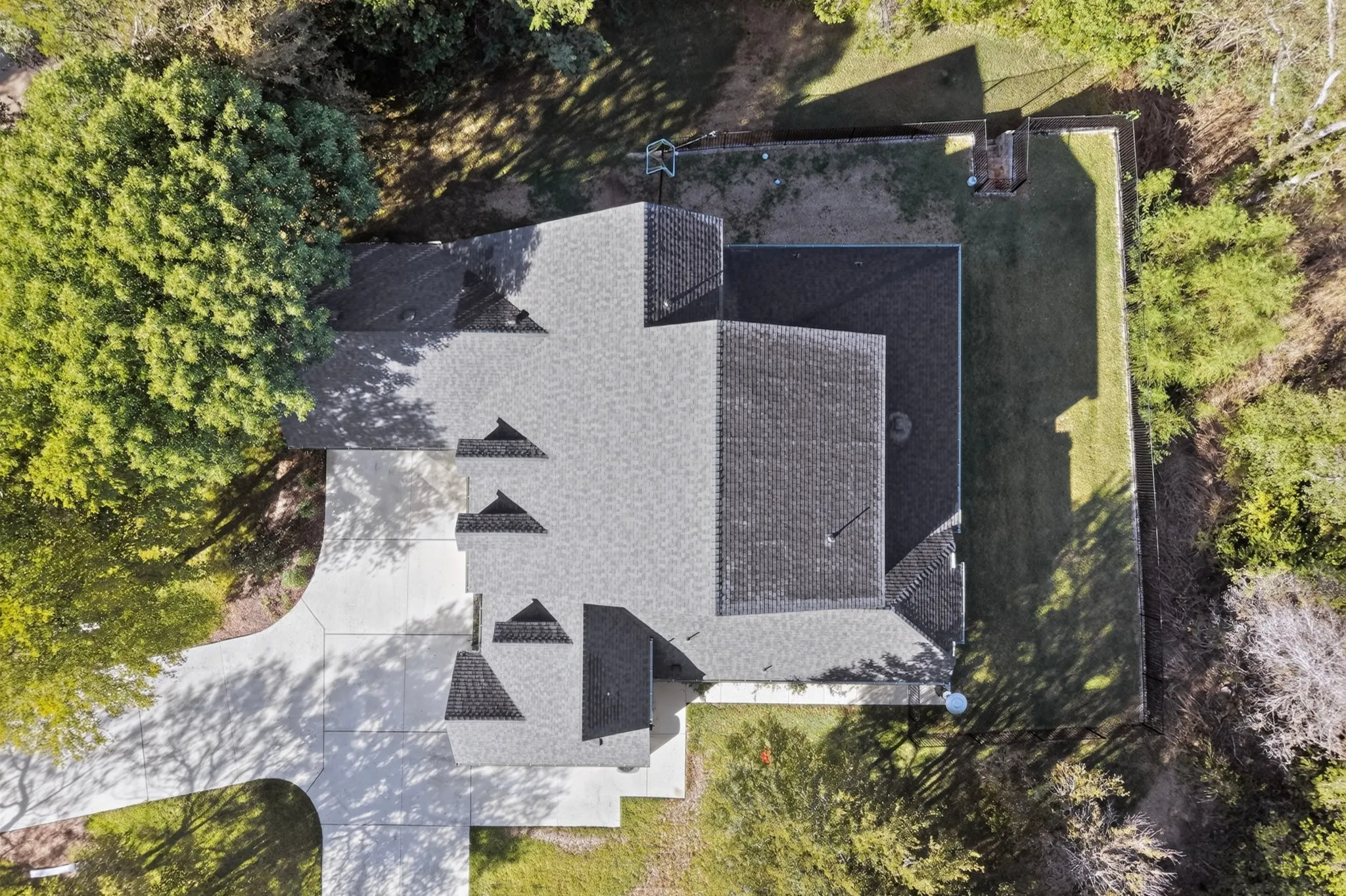 Asphalt shingle roof with multiple gables