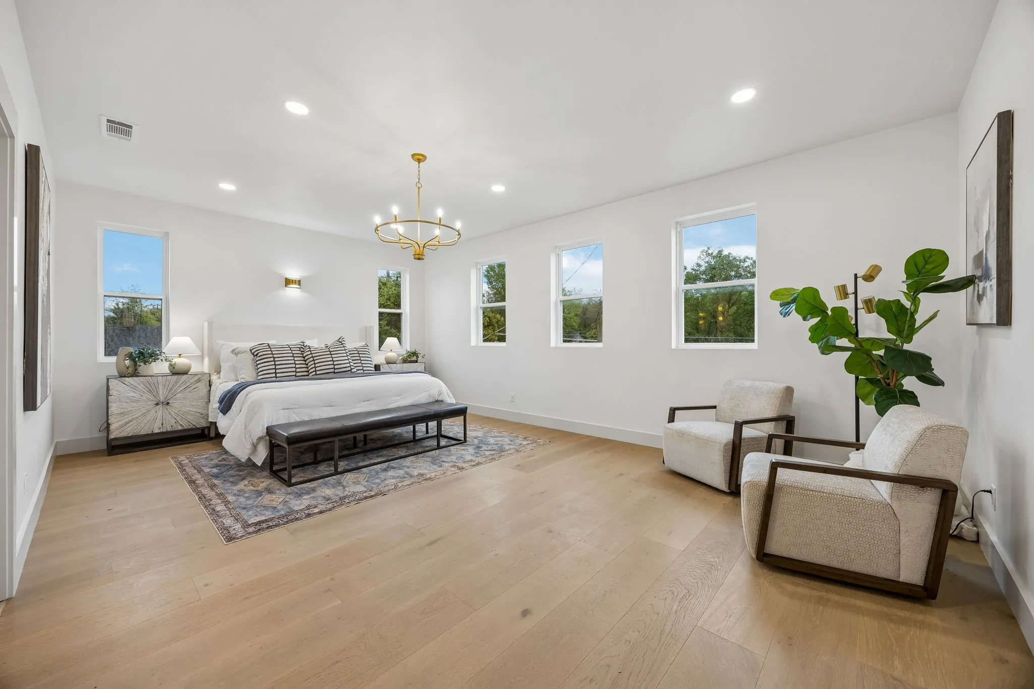 Primary bedroom with abundant natural light