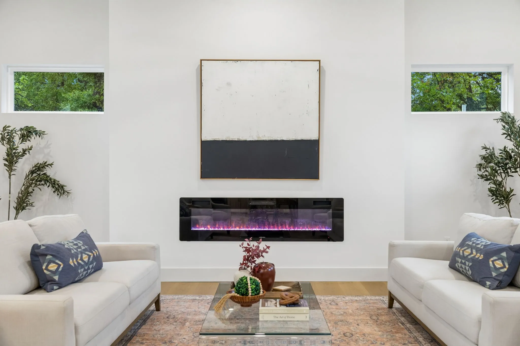 Wall-mounted electric fireplace with a black glass front