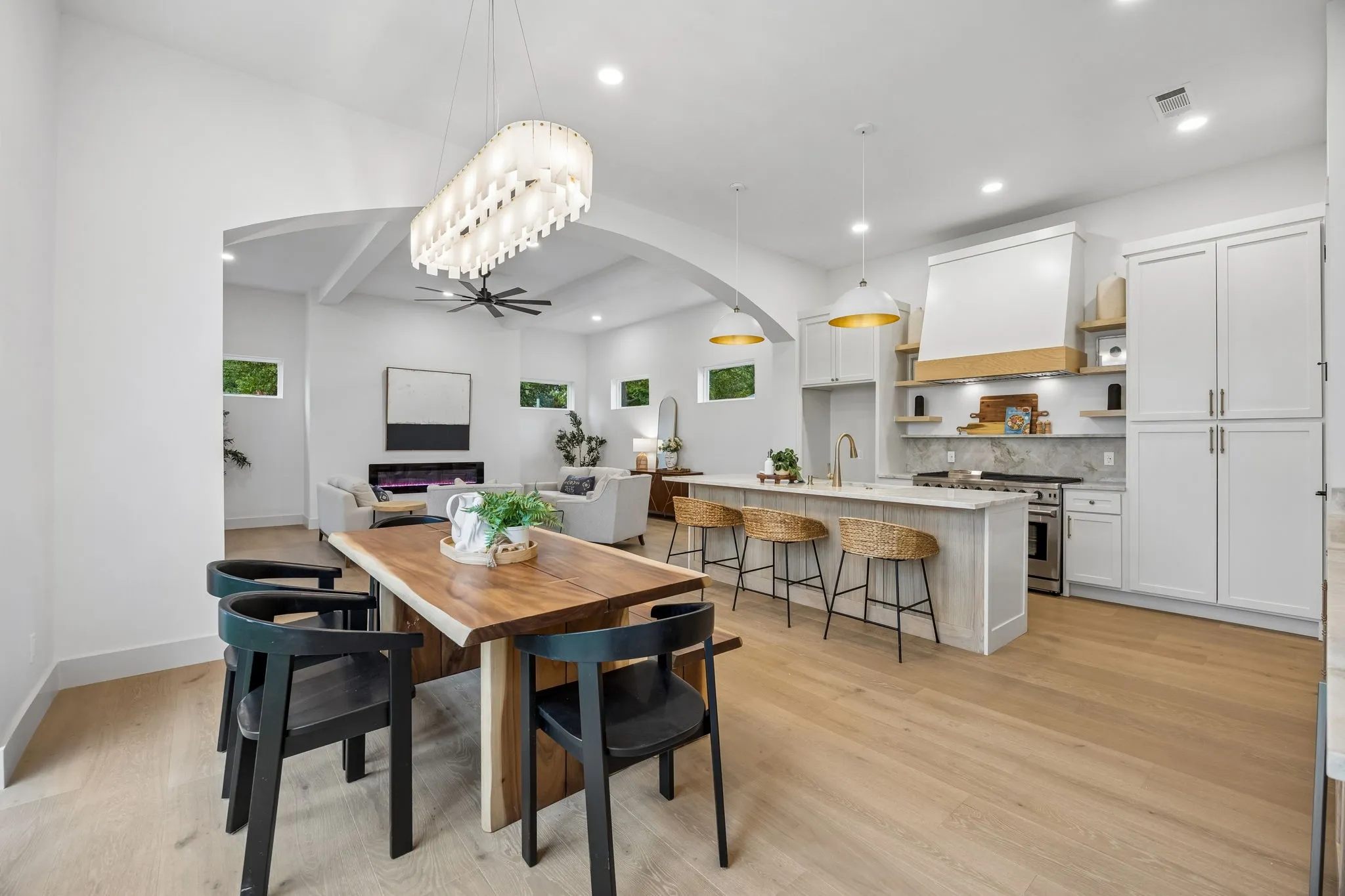 Dining area with a modern chandelier.