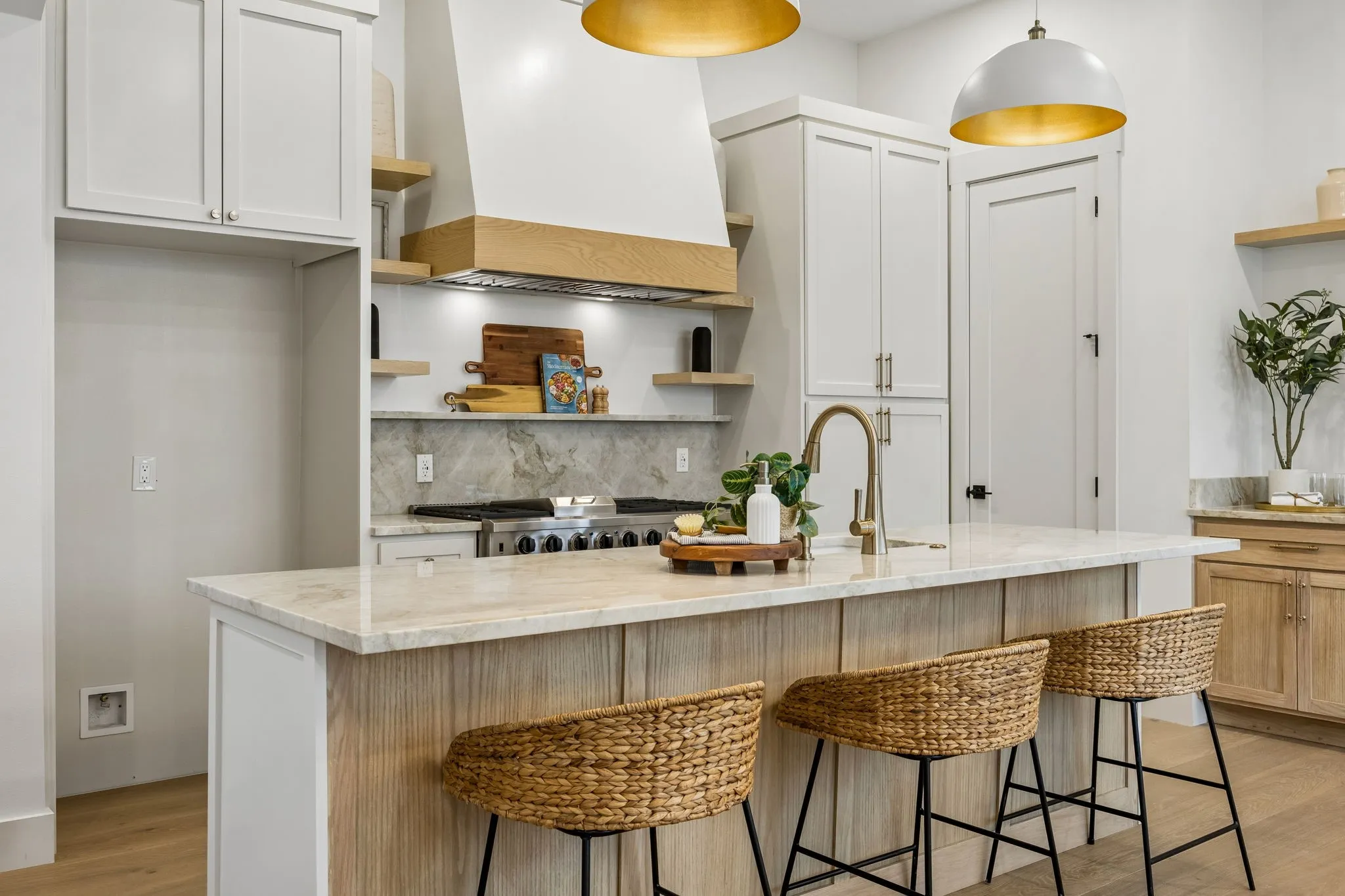 Kitchen with an island featuring seating