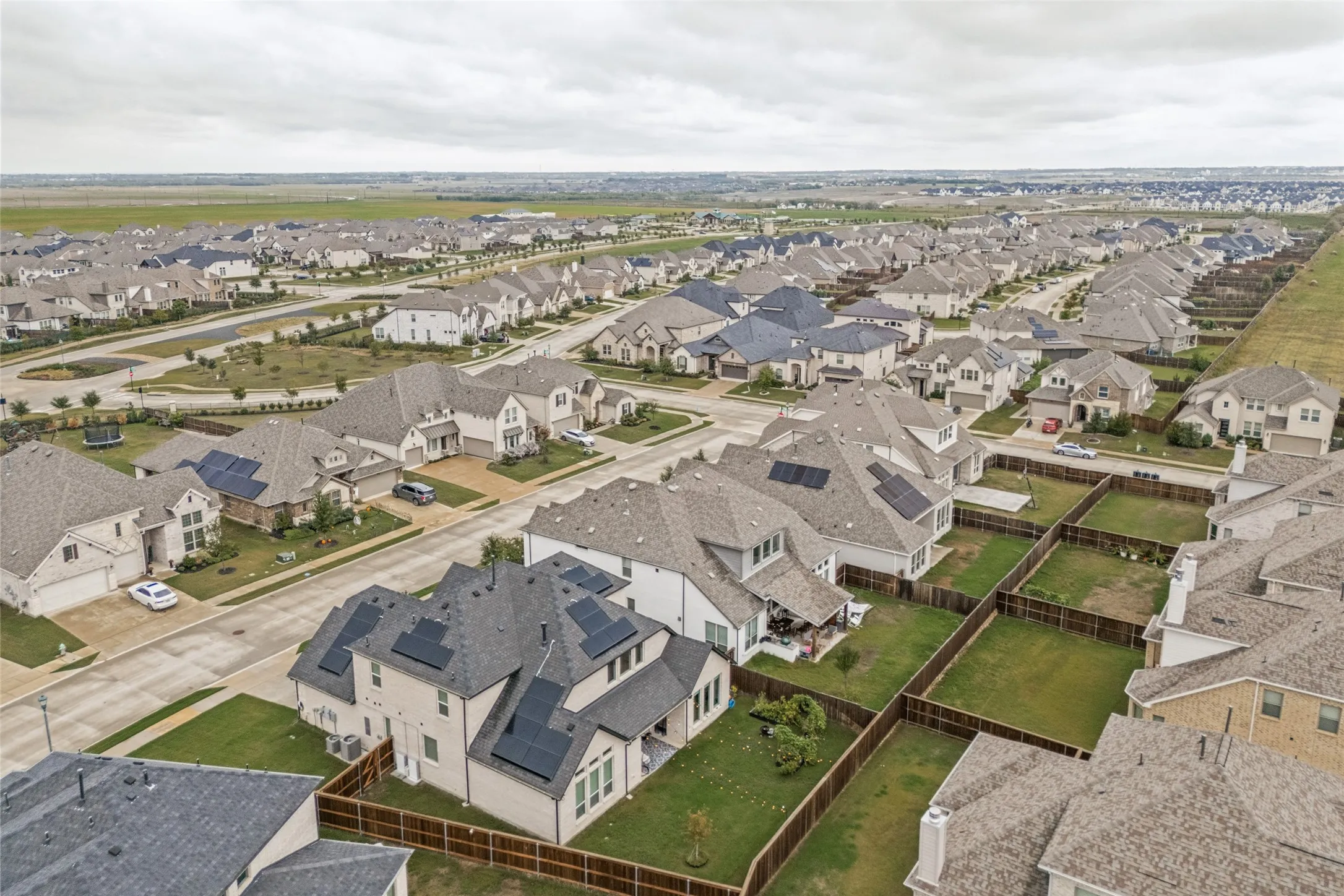 New construction residential development featuring a structured street grid and consistent property lot sizes
