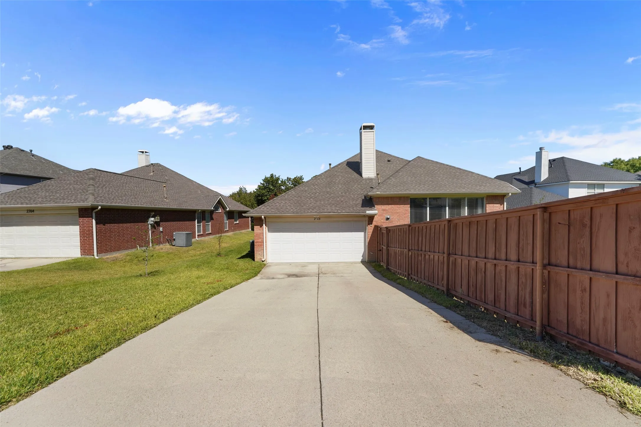 Rear Entry 2 Car Garage with Garage Door Opener