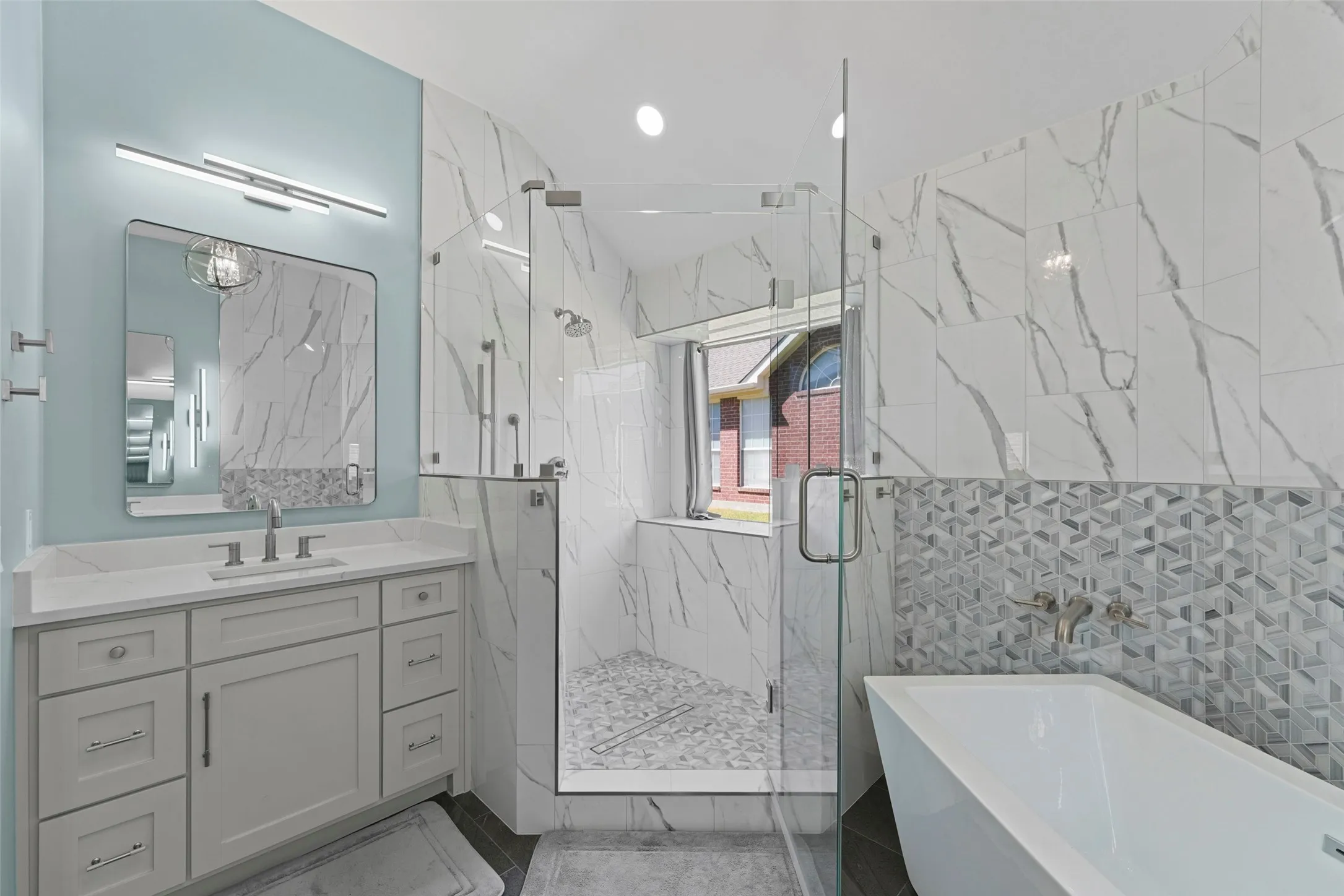 Separate walk in shower and freestanding tub