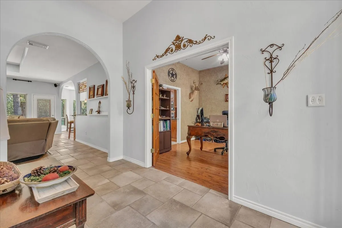 Archway entry with tile flooring