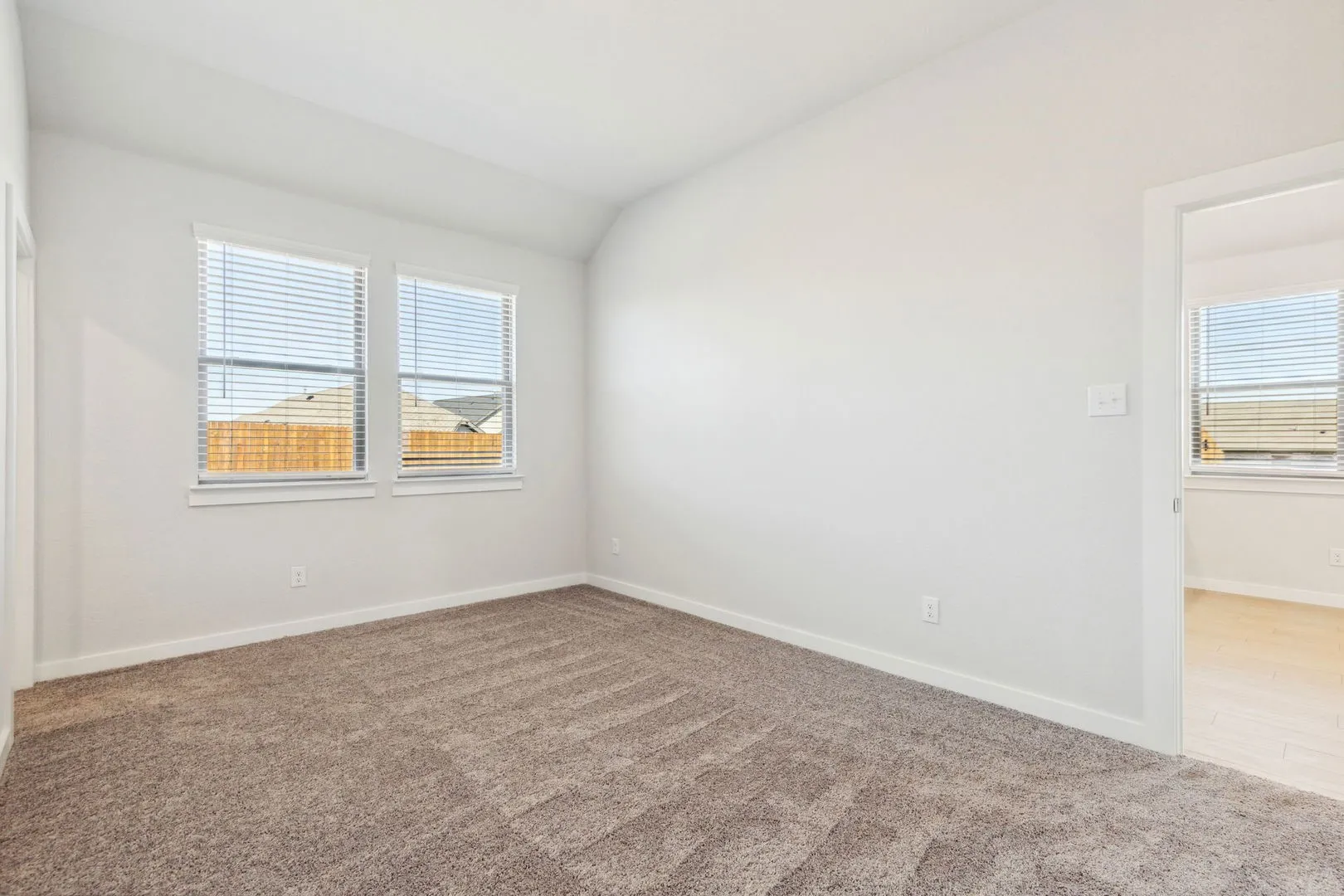 Bedroom in the Ash home plan – REPRESENTATIVE PHOTO