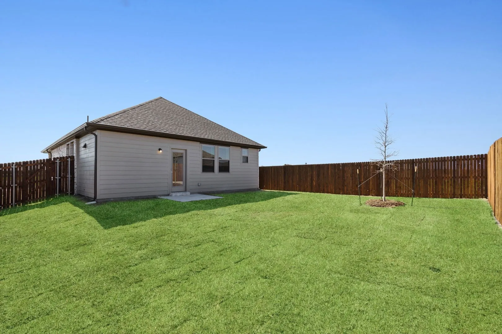 Back Yard in the Ash home plan – REPRESENTATIVE PHOTO